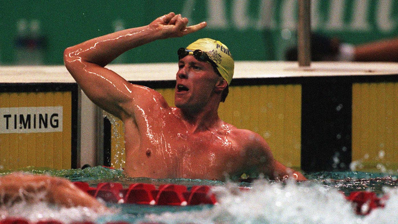 Kieren Perkins celebrates winning 1500m gold from lane eight at the Atlanta 1996 Olympics.