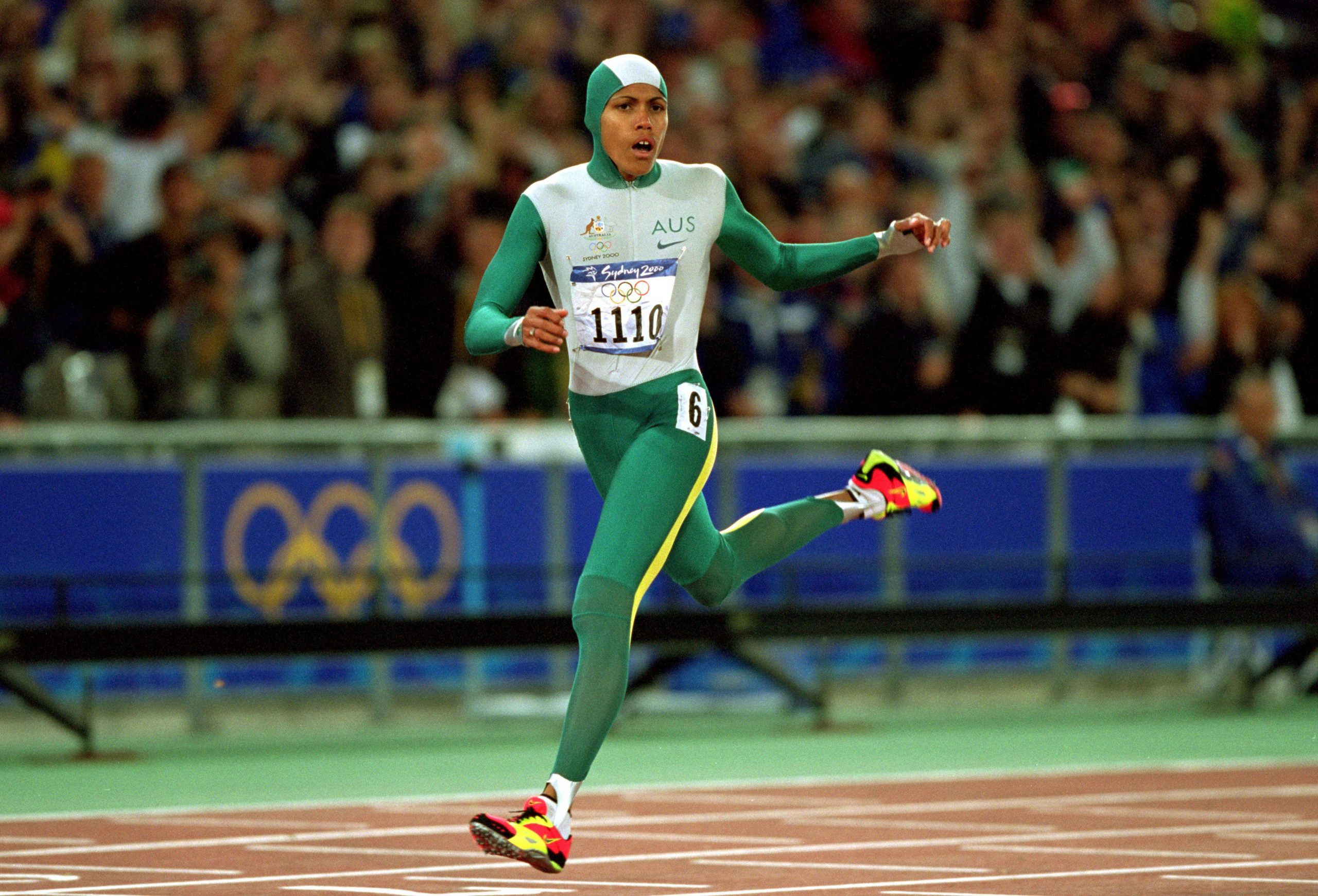 Cathy Freeman taking gold in the 400m at Sydney 2000.