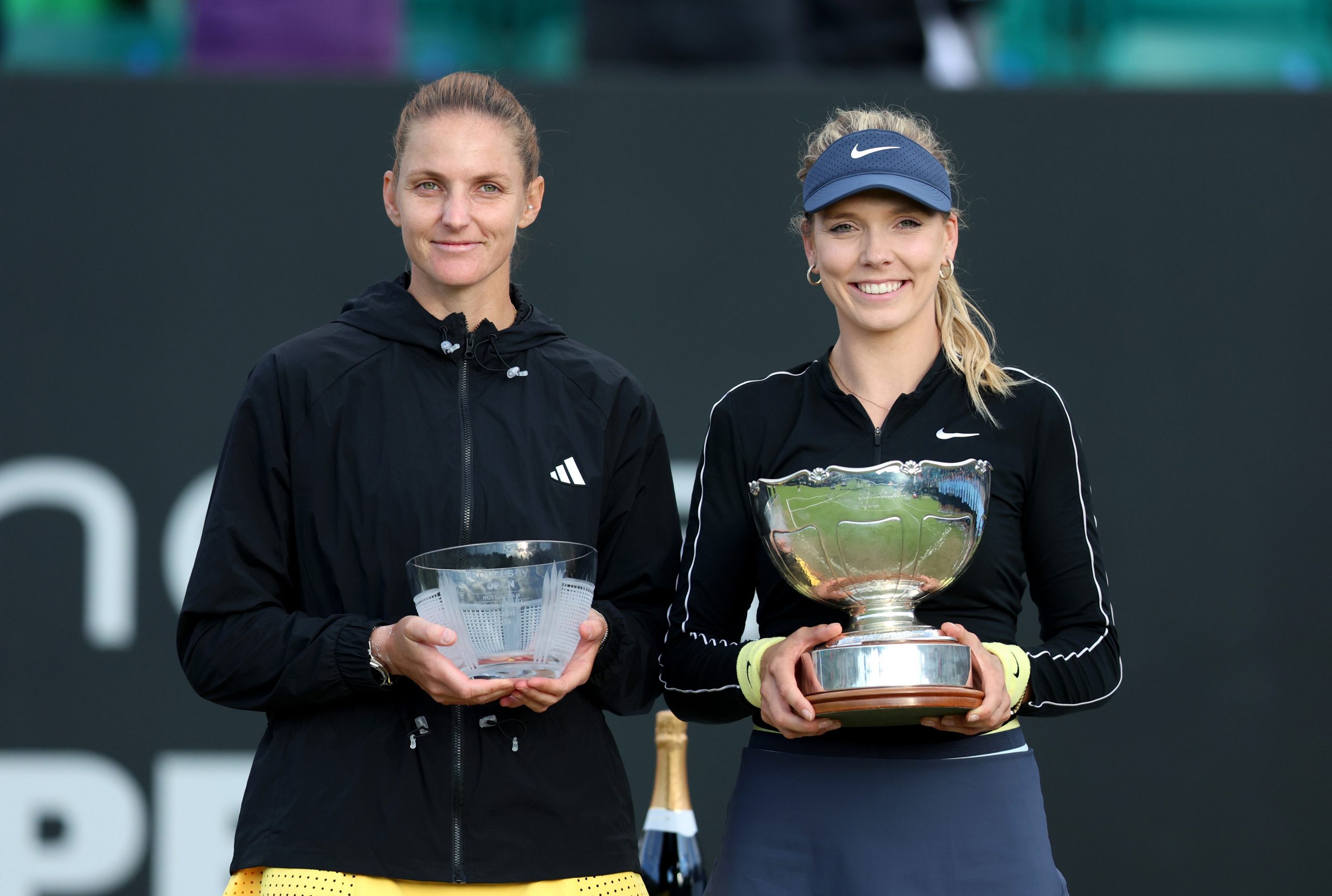 Katie Boulter (R) of Great Britain poses for a photo with the Rothesay Open Nottingham, Elena Baltacha trophy with runner up, Karolina Pliskova of Czechia following the Women's Singles Final match on Day Seven of the Rothesay Open Nottingham at Lexus Nottingham Tennis Centre on June 16, 2024 in Nottingham, England.  (Photo by Nathan Stirk/Getty Images for LTA)