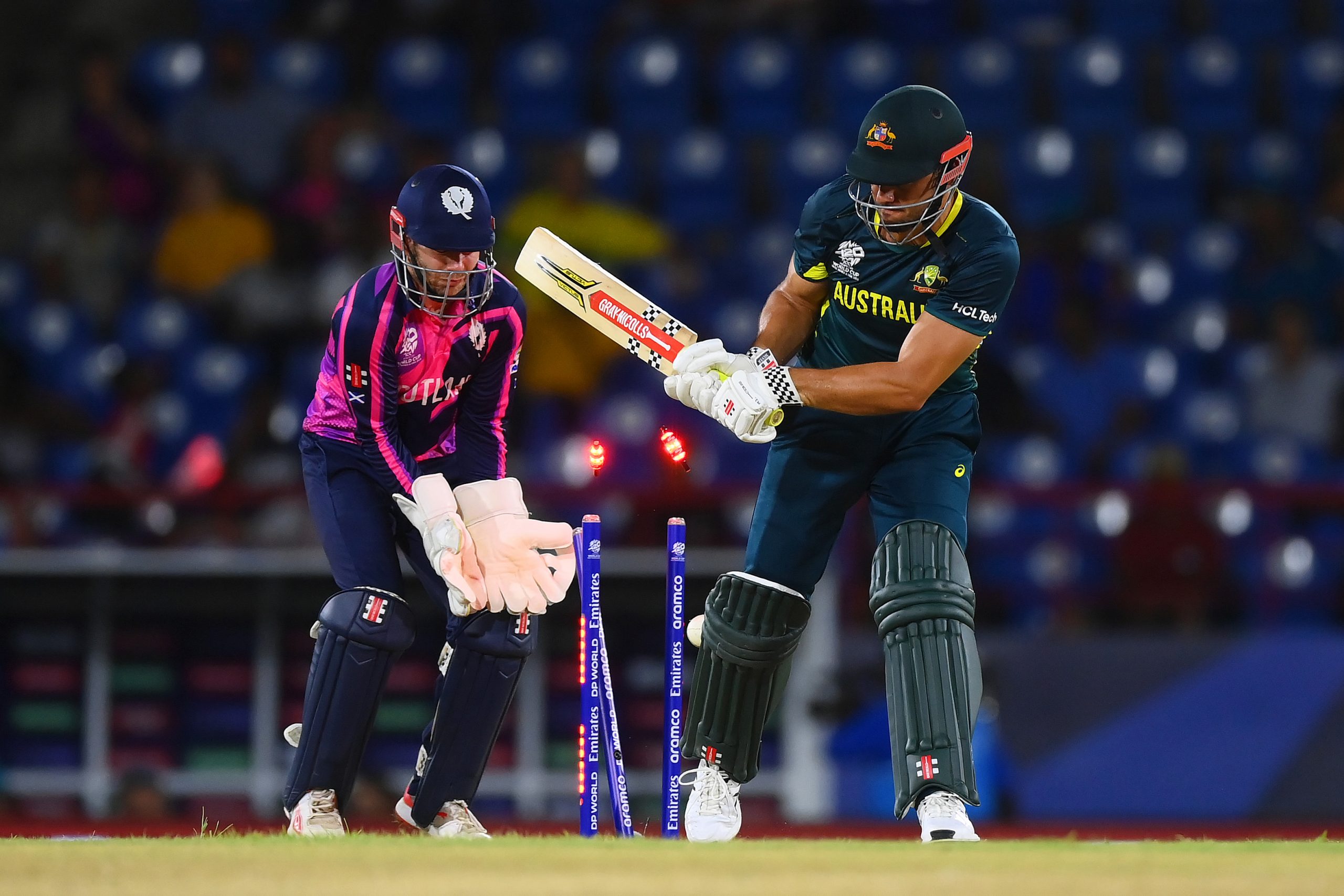 Marcus Stoinis of Australia is bowled by Mark Watt of Scotland (not pictured) during the ICC Men's T20 Cricket World Cup West Indies & USA 2024 match between Australia and Scotland at Daren Sammy National Cricket Stadium on June 15, 2024 in Gros Islet, Saint Lucia. (Photo by Alex Davidson-ICC/ICC via Getty Images)