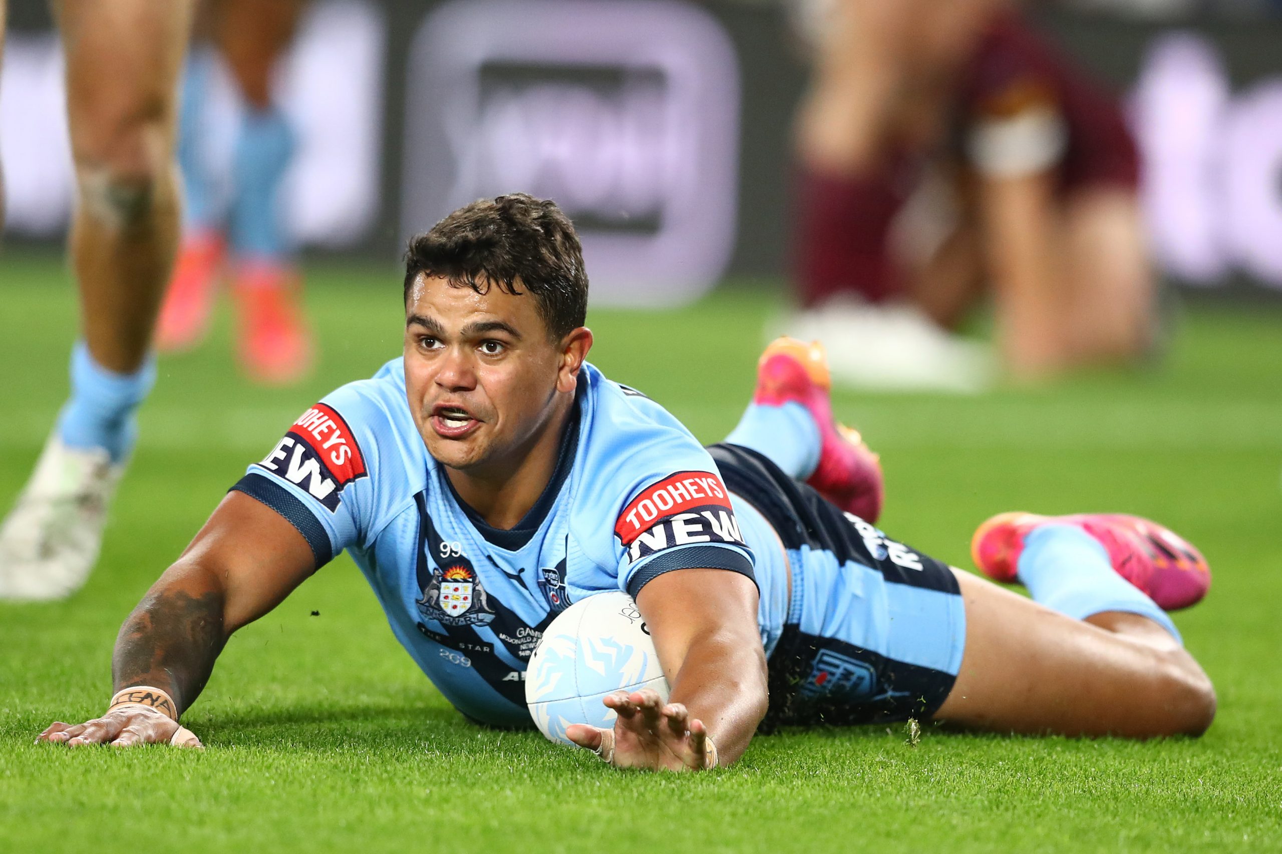 Latrell Mitchell of the Blues scores a try during game three of the 2021 State of Origin Series between the New South Wales Blues and the Queensland Maroons at Cbus Super Stadium on July 14, 2021 in Gold Coast, Australia. (Photo by Chris Hyde/Getty Images)