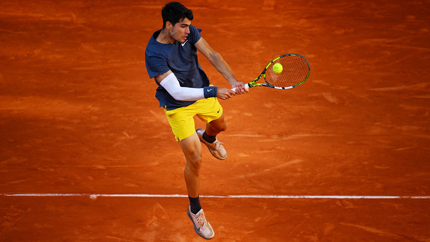 Carlos Alcaraz in action during the French Open final against Alexander Zverev.