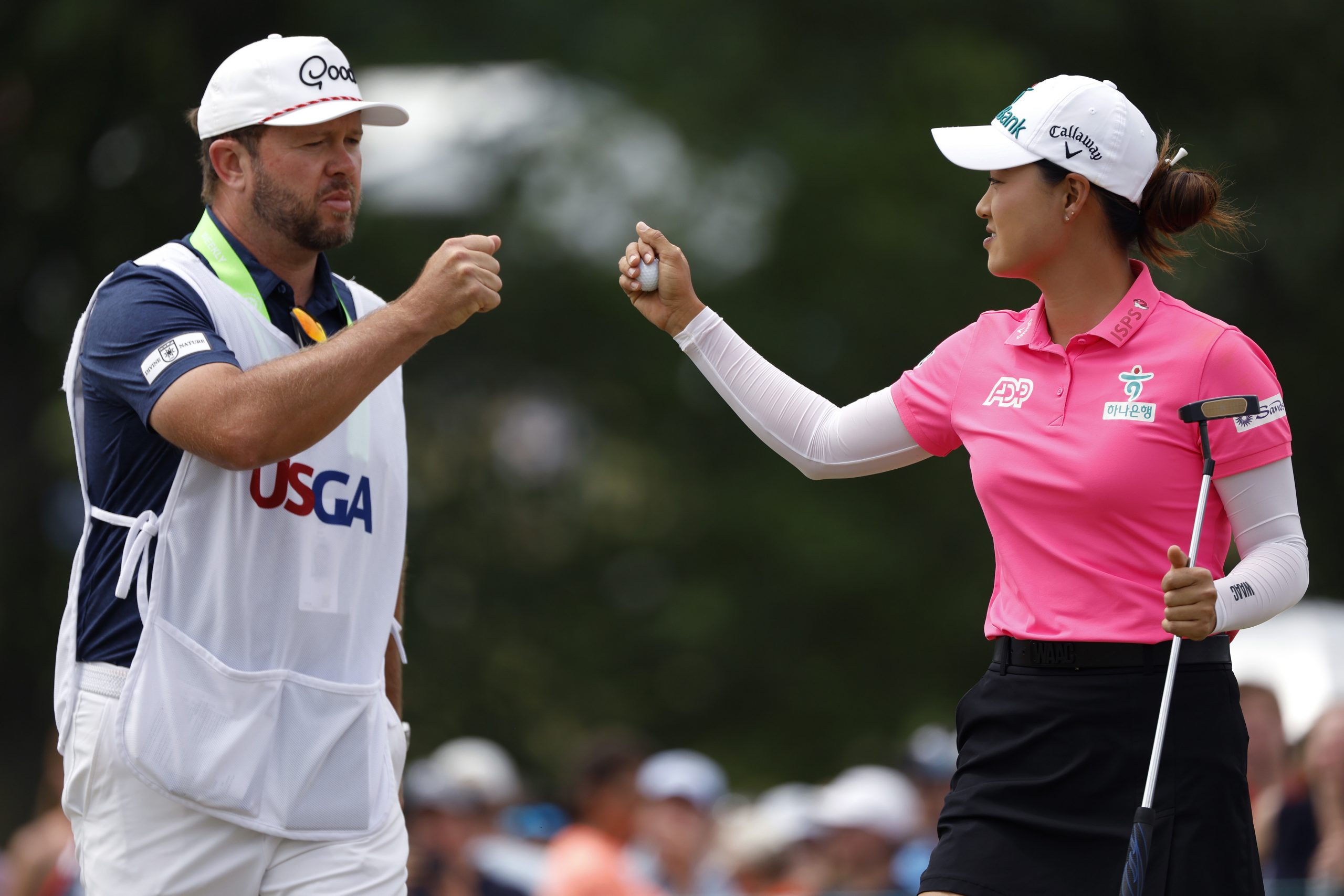 Minjee Lee of Australia celebrates with her caddie on the first green during the final round of the U.S. Women's Open Presented by Ally at Lancaster Country Club on June 02, 2024 in Lancaster, Pennsylvania. (Photo by Sarah Stier/Getty Images)