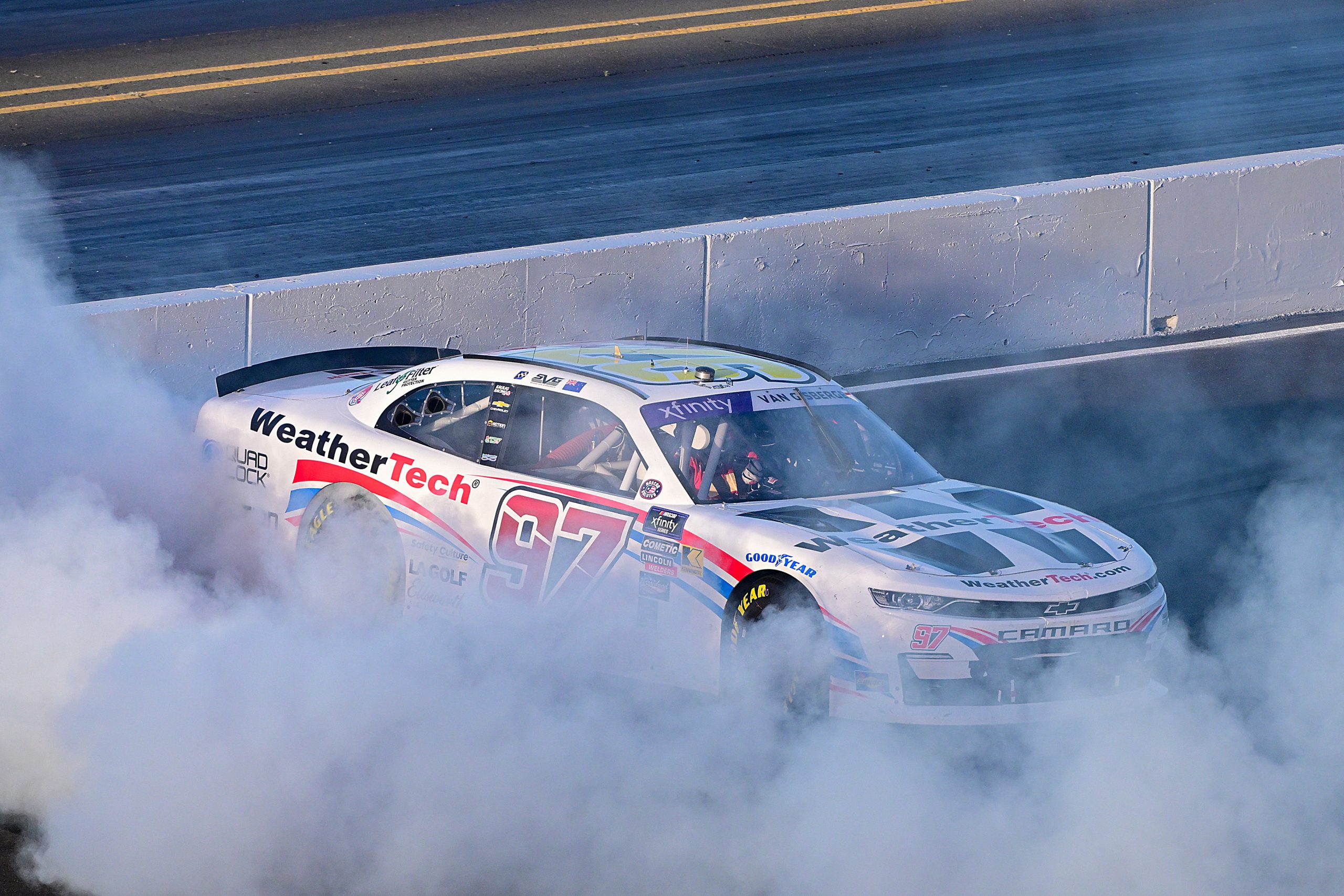 Shane van Gisbergen, driver of the No.97 Chevrolet Camaro, celebrates with a burnout.