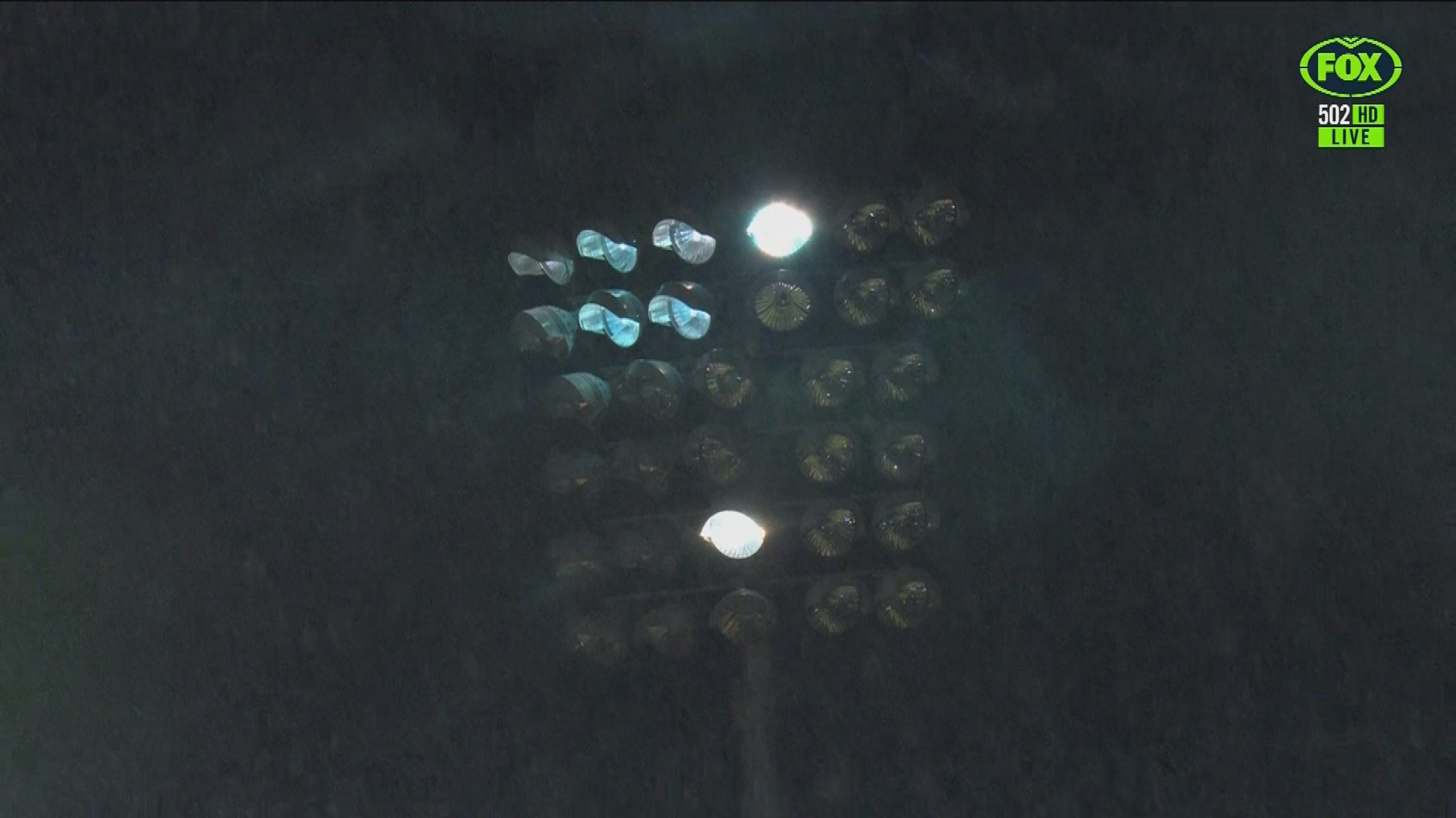 A light tower at BlueBet Stadium fell to darkness as players ran onto the field for the second half.