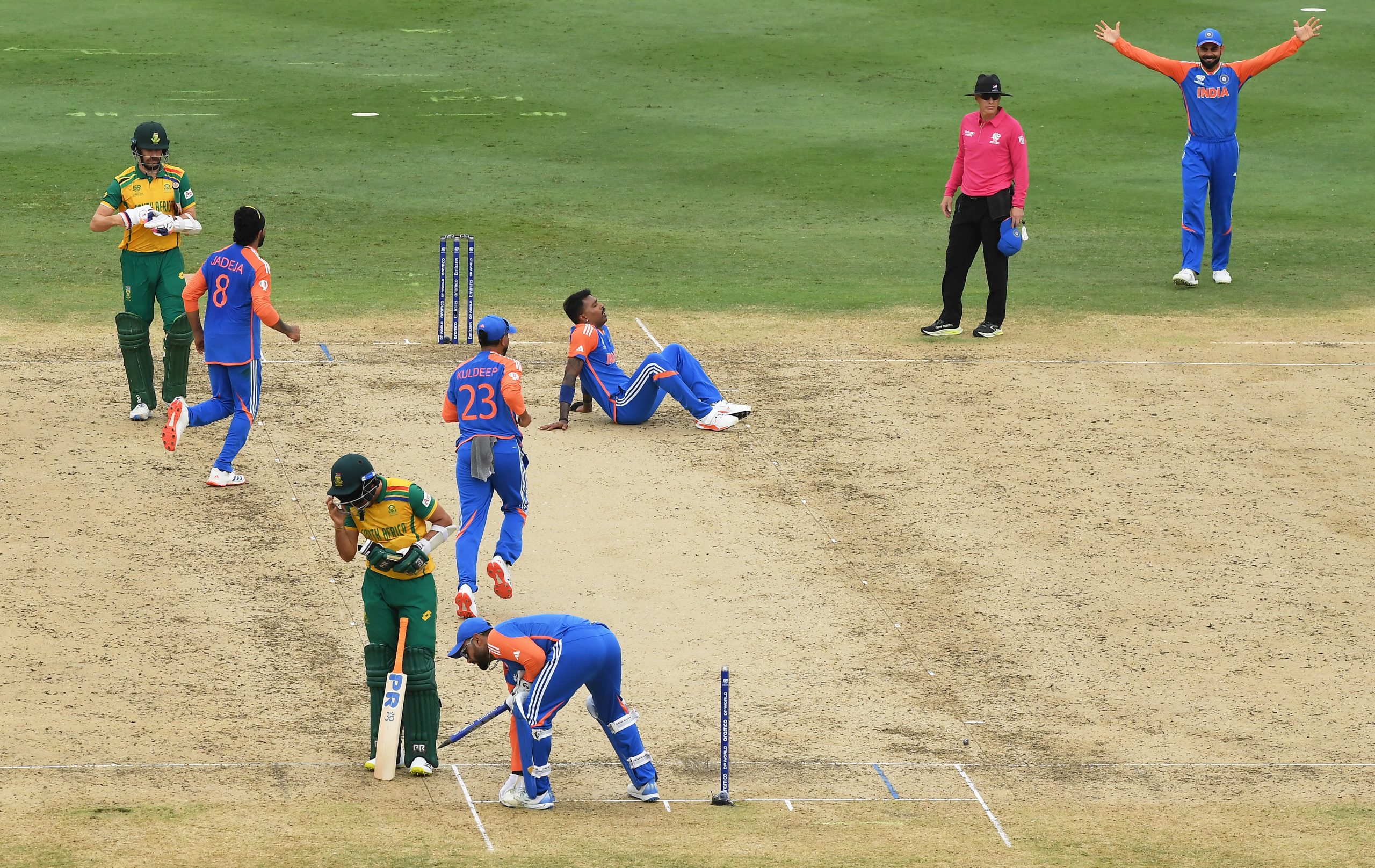 Virat Kohli, Hardik Pandya, Ravi Jadeja, Kuldeep Yadav and Rishabh Pant of India celebrate victory on the final delivery following the ICC Men's T20 Cricket World Cup West Indies & USA 2024 Final match between South Africa and India at Kensington Oval on June 29, 2024 in Bridgetown, Barbados. (Photo by Alex Davidson-ICC/ICC via Getty Images)