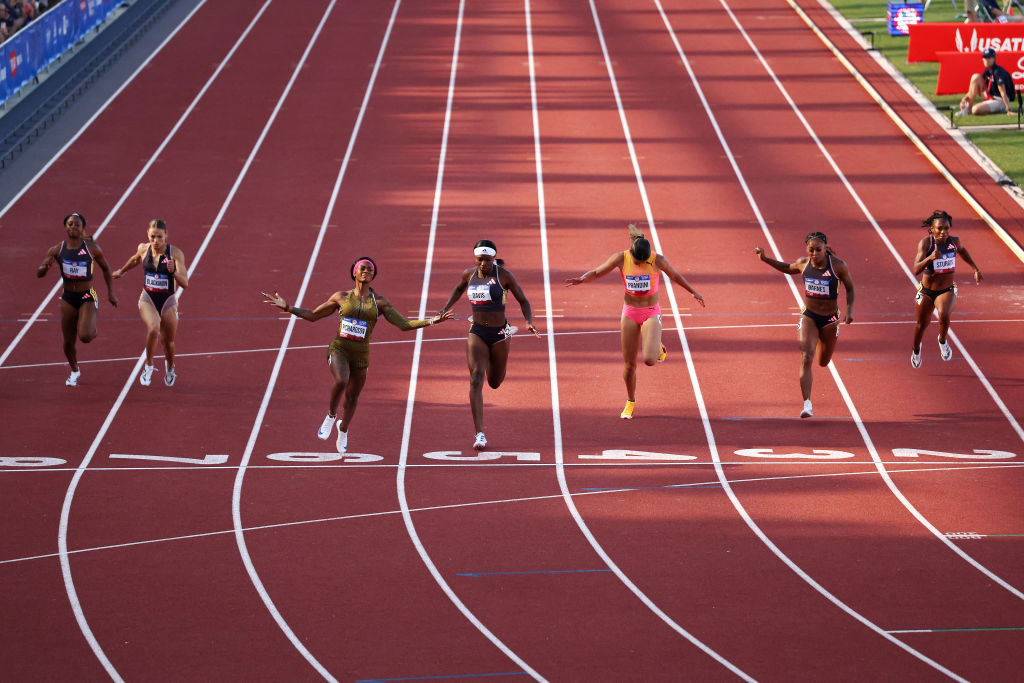 Sha'Carri Richardson crosses the finish line.