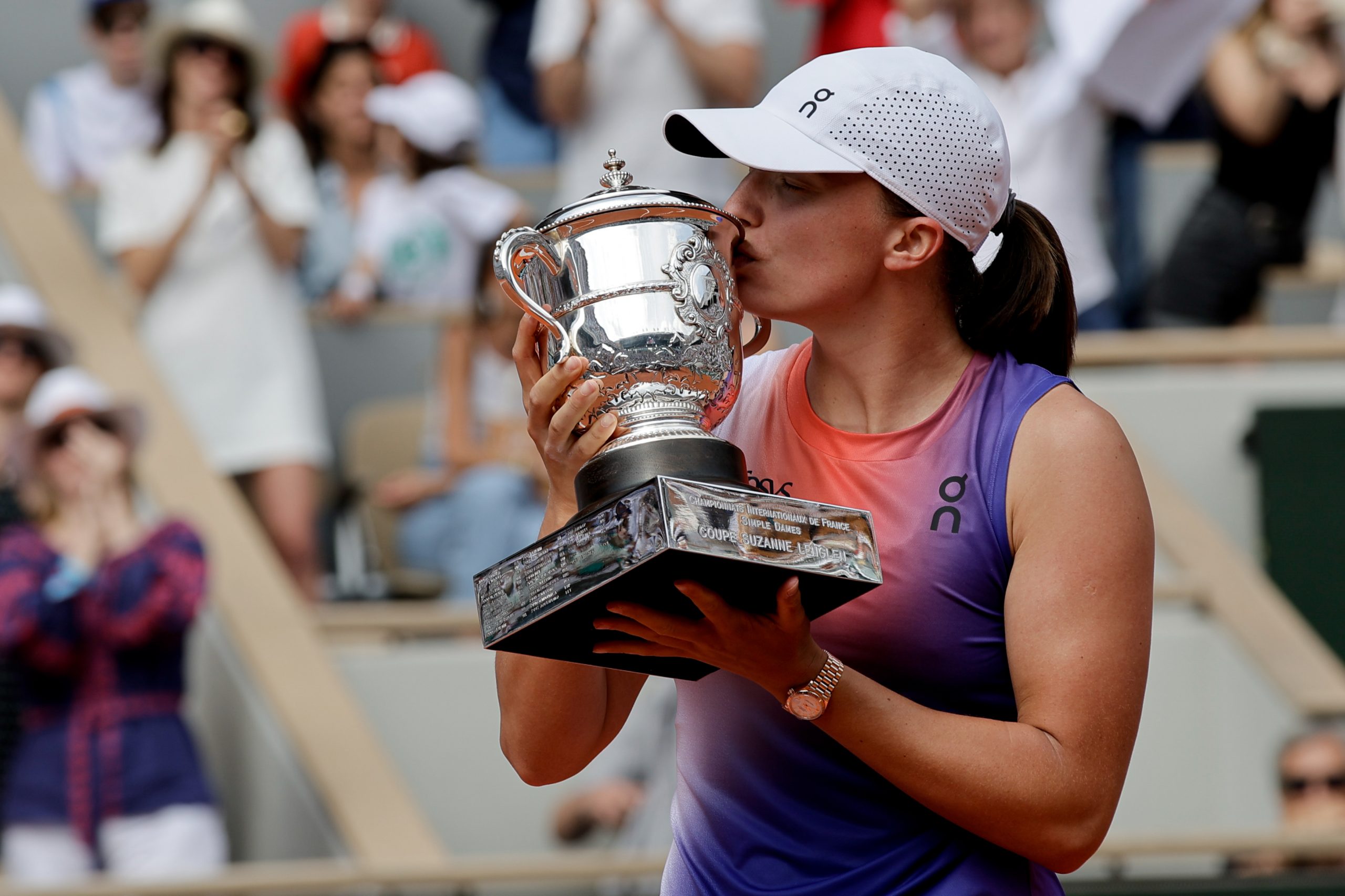 Iga Swiatek of Poland hold the cup after winning against Jasmine Paolini of Italy (not seen) during the Women's Singles Final match on day fourteen of the 2024 French Open at Roland Garros Complex in Paris, France on June 8, 2024. (Photo by Antonio Borga/Anadolu via Getty Images)