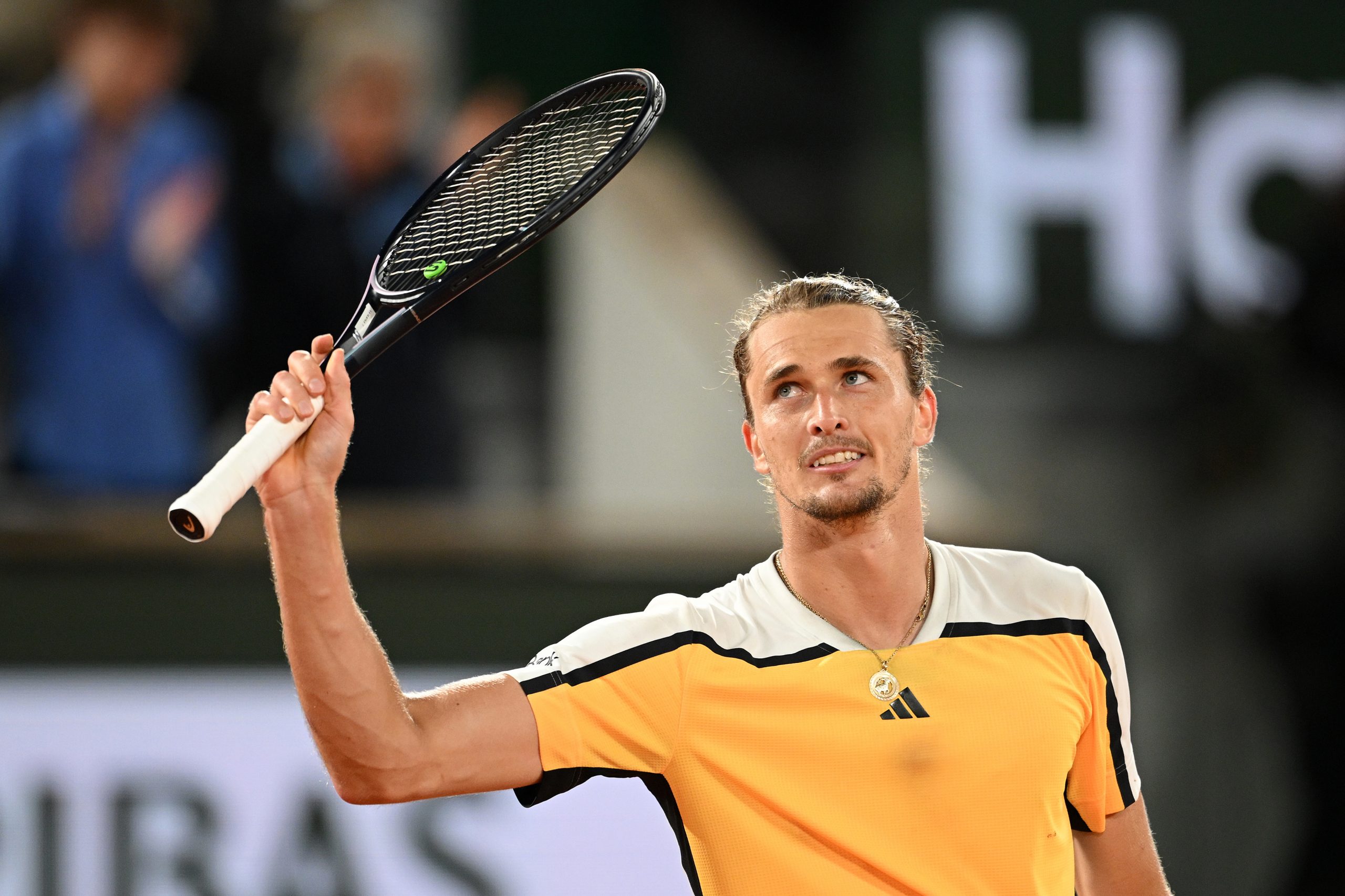 Alexander Zverev of Germany celebrates winning match point against Holger Rune of Denmark.