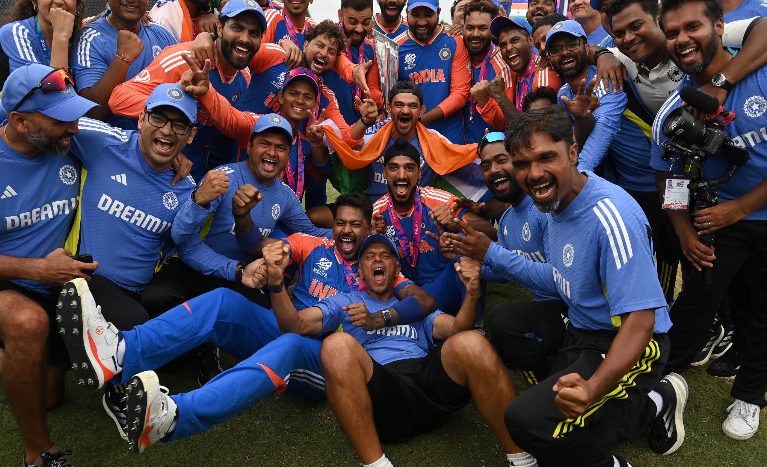 Rahul Dravid and the India team celebrate after India won the ICC Men's T20 Cricket World Cup West Indies & USA 2024 Final match between South Africa and India at Kensington Oval on June 29, 2024 in Bridgetown, Barbados. (Photo by Philip Brown/Getty Images)