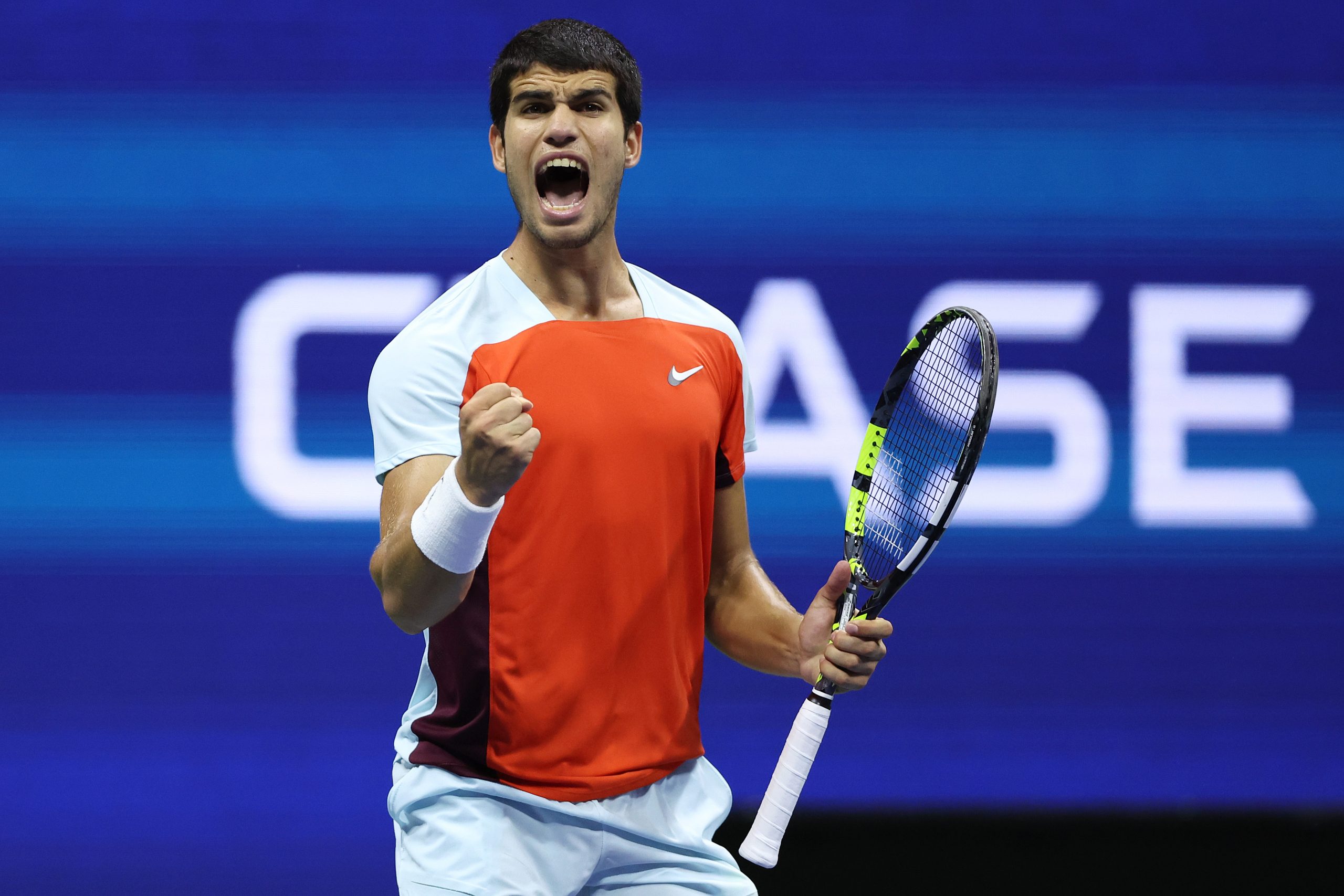 Carlos Alcaraz of Spain celebrates winning the second set against Frances Tiafoe of the United States.