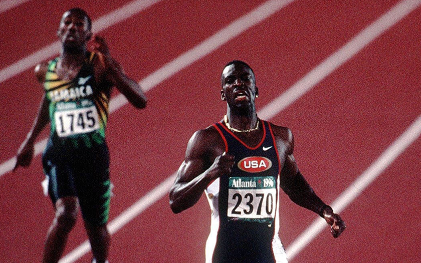 US sprinter Michael Johnson won gold in the 400m and set a new Olympic record at the Sydney 2000 Games.