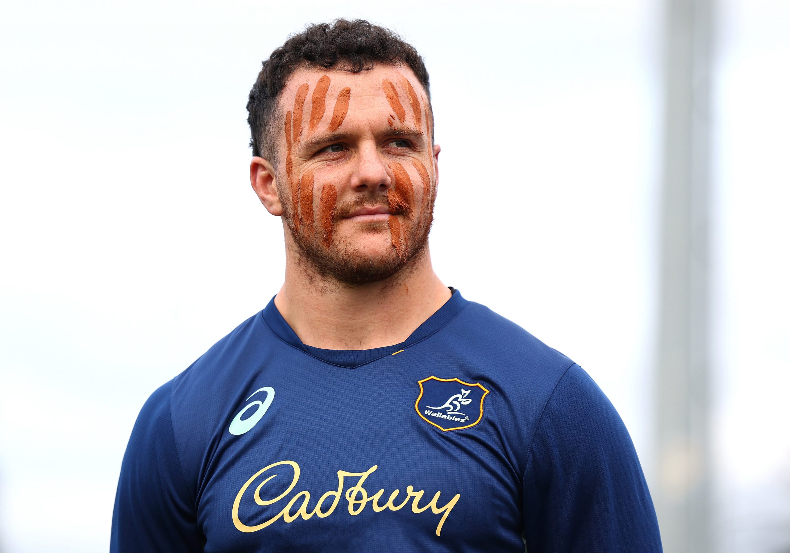 Dylan Pietsch of the Wallabies after having his face painted by First Nations advisor Dean Duncan.