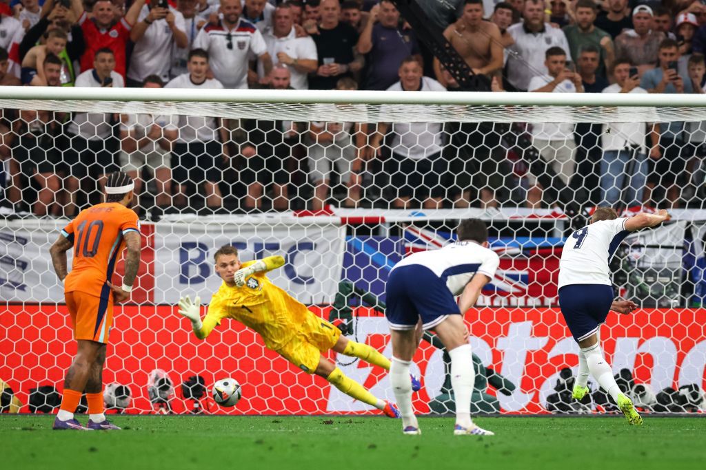 Harry Kane of England shoots a penalty and scores during the UEFA EURO 2024 semi-final match between Netherlands and England at Football Stadium Dortmund on July 10, 2024 in Dortmund, Germany. (Photo by Inaki Esnaola/Getty Images)