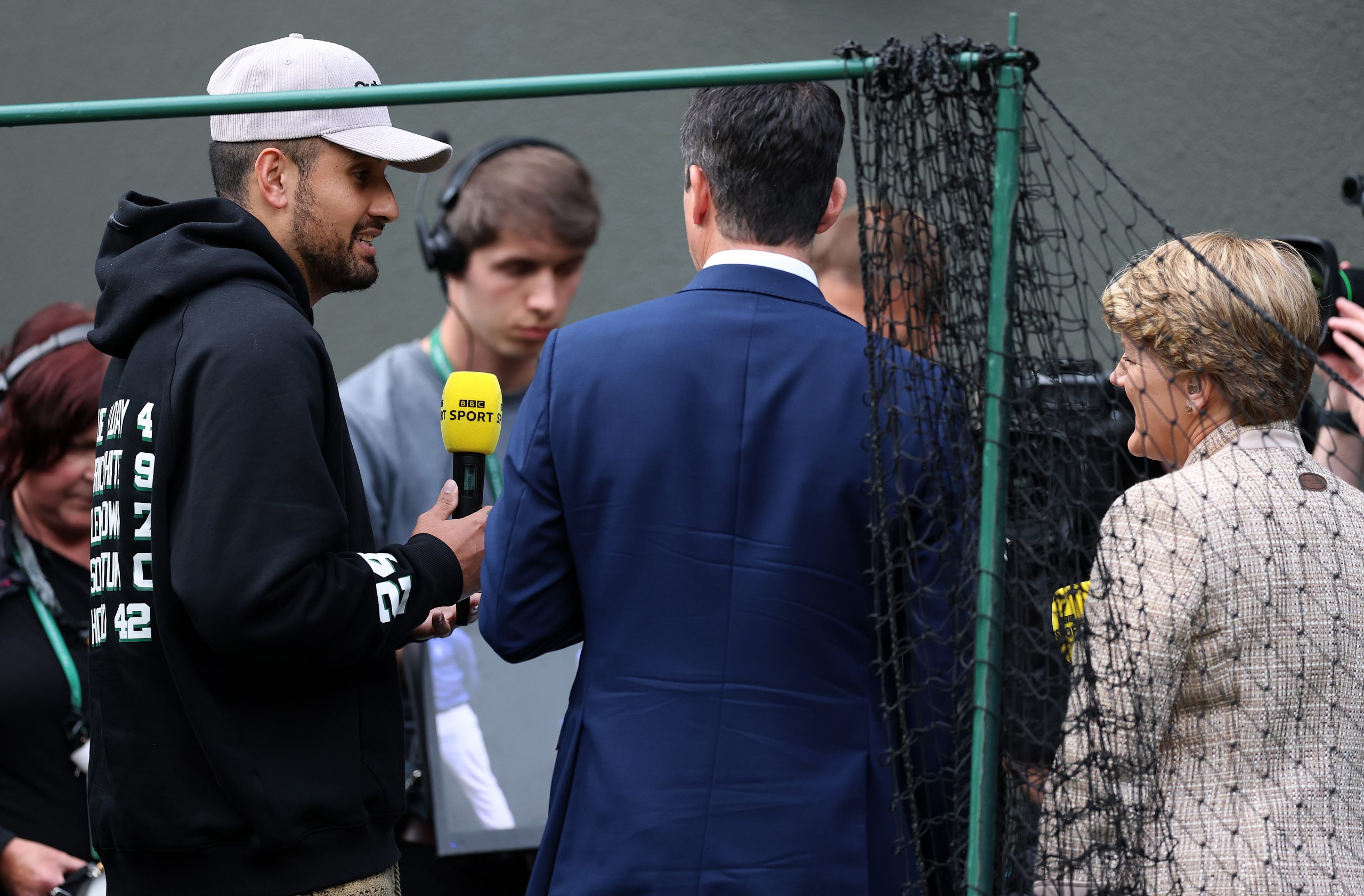 Nick Kyrgios talks on BBC after Taylor Fritz of United States lost to Lorenzo Musetti of Italy in the Gentlemen's Singles Quarter Final match during day ten of The Championships Wimbledon 2024 at All England Lawn Tennis and Croquet Club on July 10, 2024 in London, England. (Photo by Julian Finney/Getty Images)