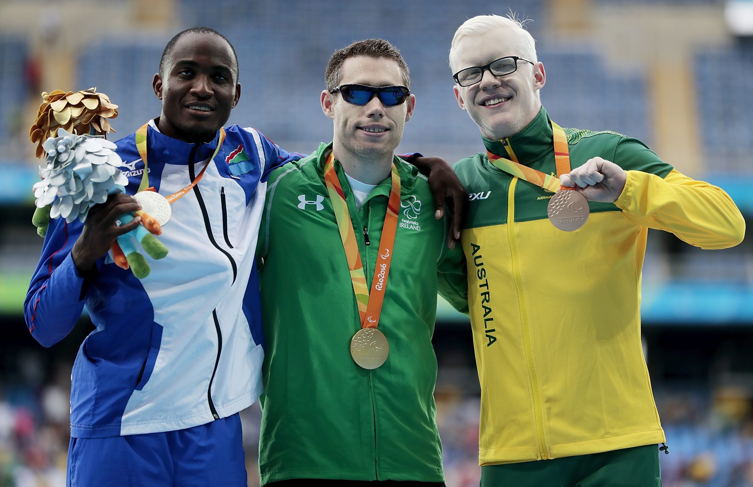 Chad Perris (right) poses after winning bronze at the Rio 2016 Paralympics.