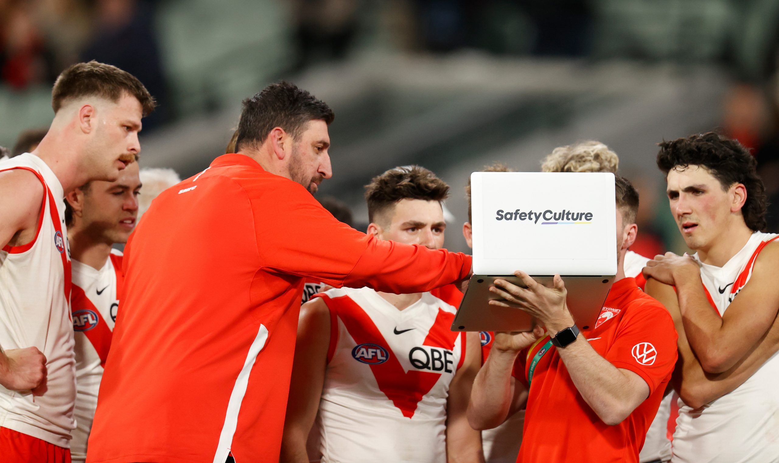 Dean Cox, Game Strategy & Ruck Coach of the Swans instructs players.