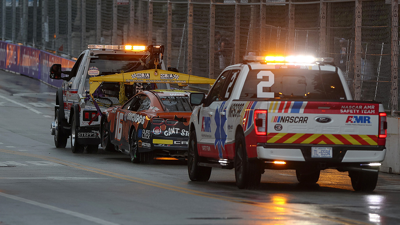 The car of Shane Van Gisbergen is towed off track after an incident during the NASCAR Cup Series Grant Park 165 at Chicago Street Course on July 07, 2024 in Chicago, Illinois. (Photo by Meg Oliphant/Getty Images)