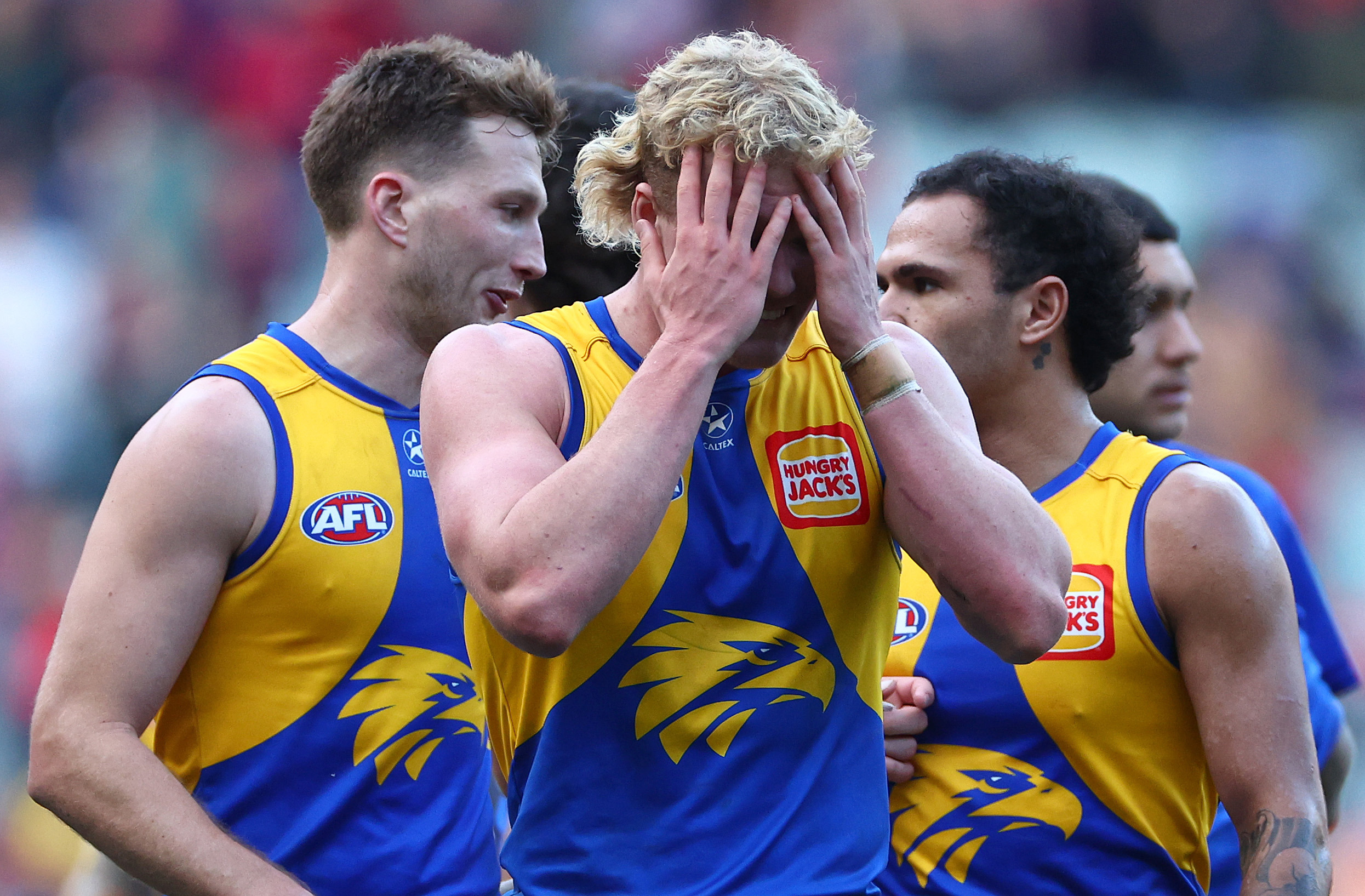 Reuben Ginbey of the Eagles looks dejected after losing to the Dees.