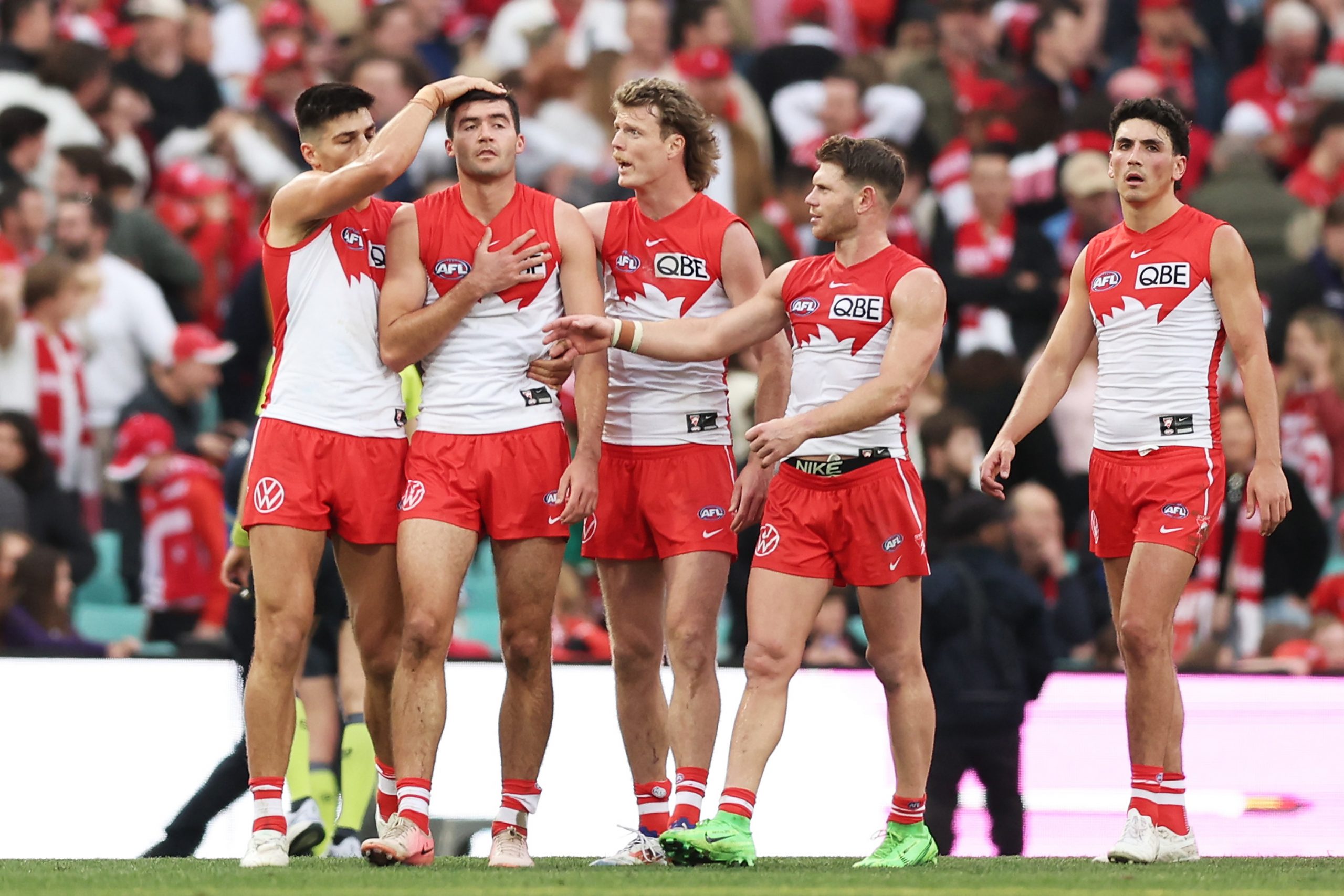 Logan McDonald is consoled after missing a shot after the siren.