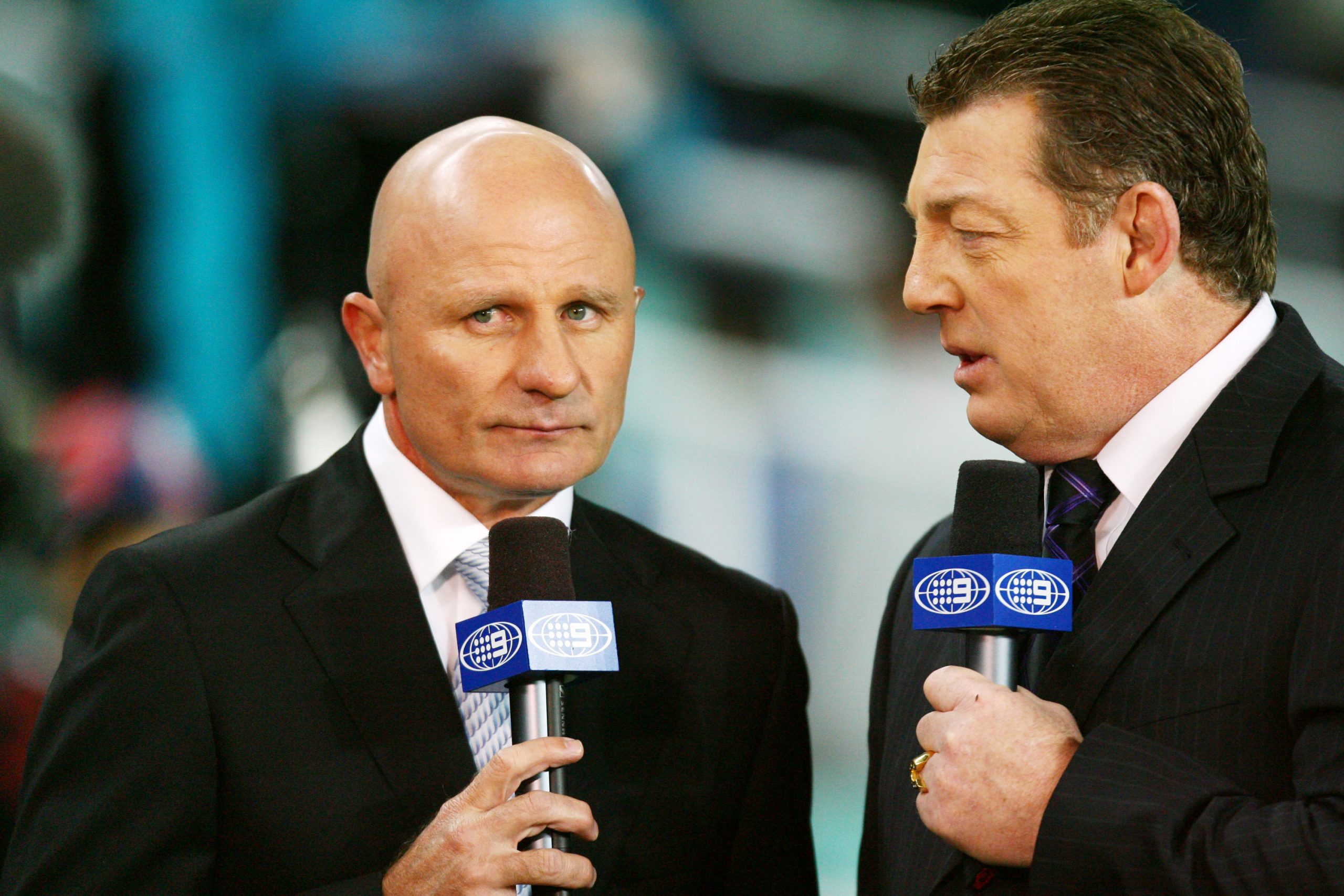 Channel Nine commentators Peter Sterling and Phil Gould talk on camera before the round 14 NRL match between the Sydney Roosters and the Penrith Panthers at Sydney Football Stadium on June 13, 2008 in Sydney, Australia. (Photo by Mark Nolan/Getty Images)