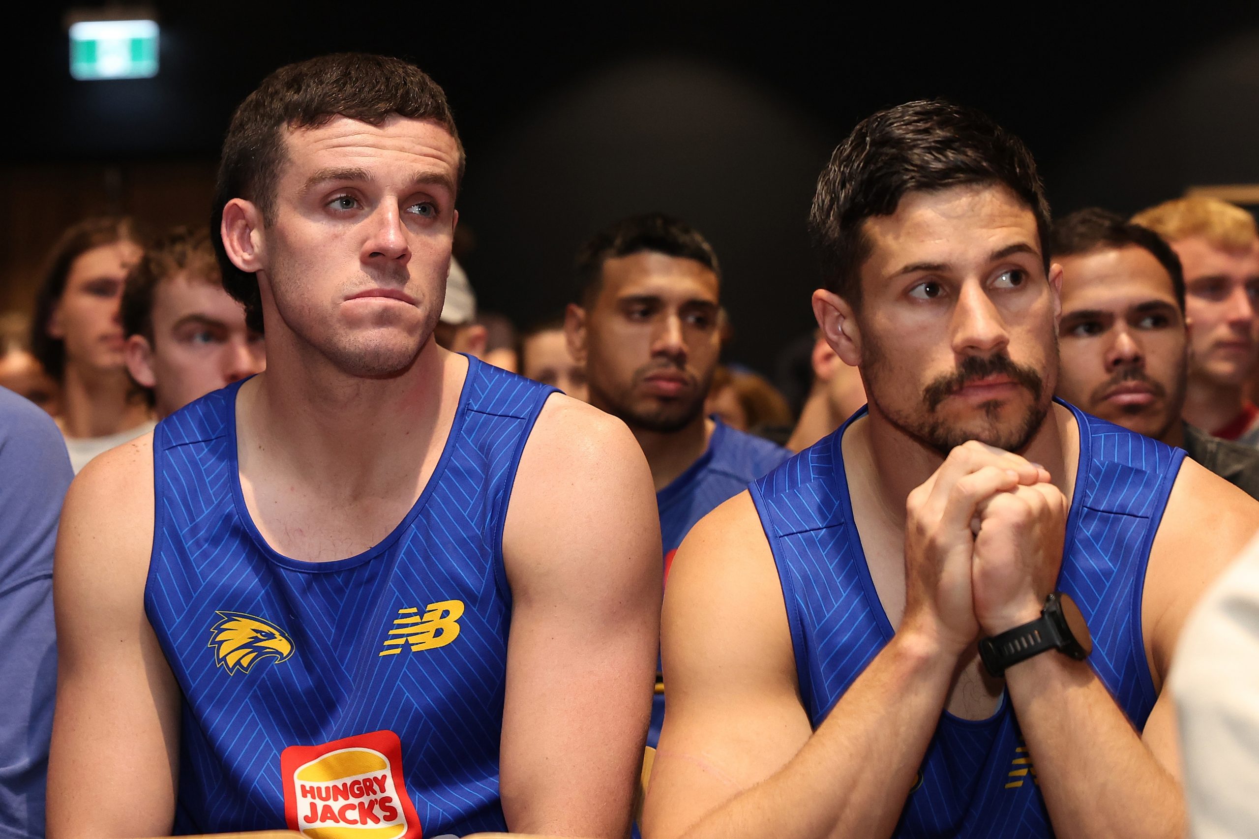 Jake Waterman and Liam Duggan look on as Adam Simpson confirms he is no longer Eagles coach.