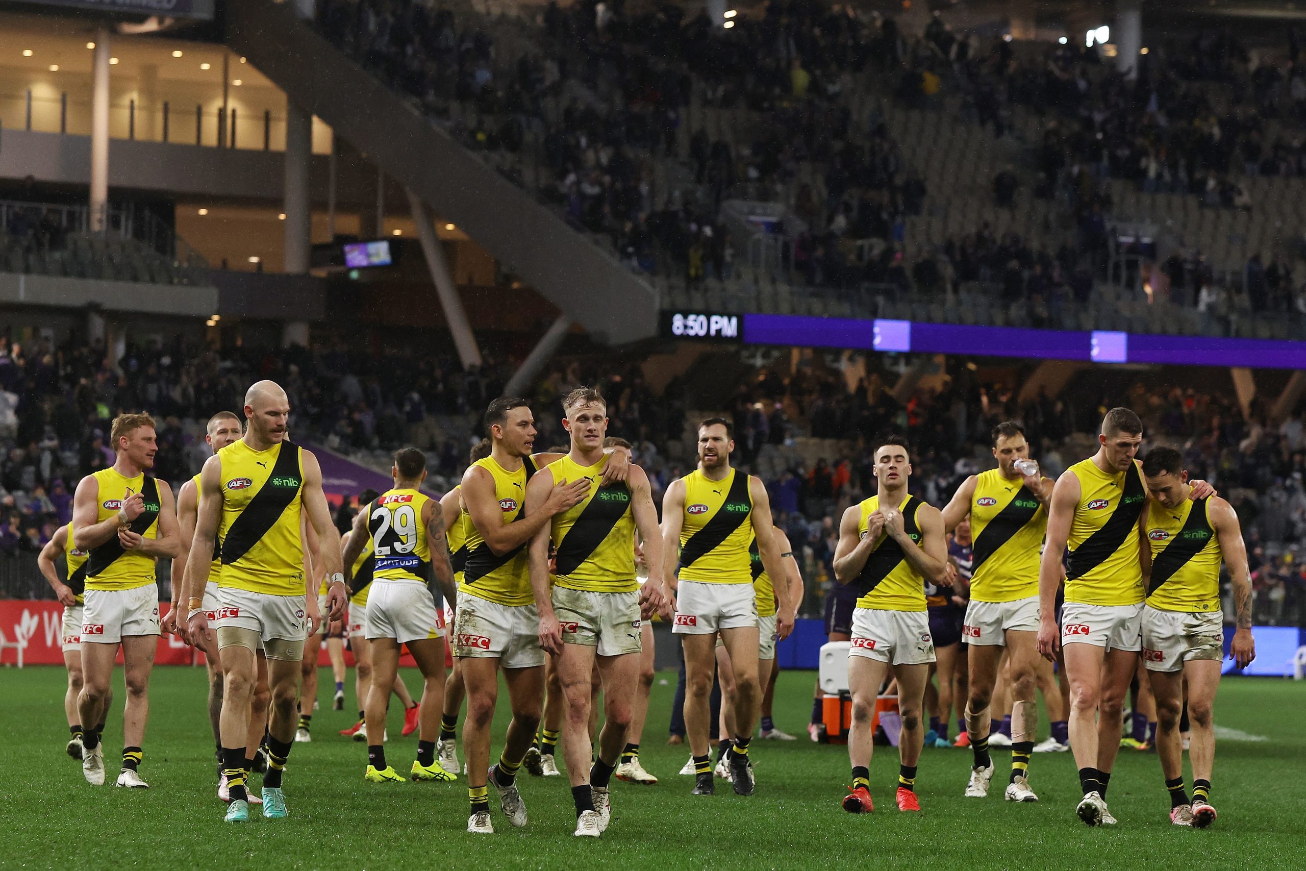 The Tigers leave the field after their loss to Fremantle that moved them to 18th on the ladder.