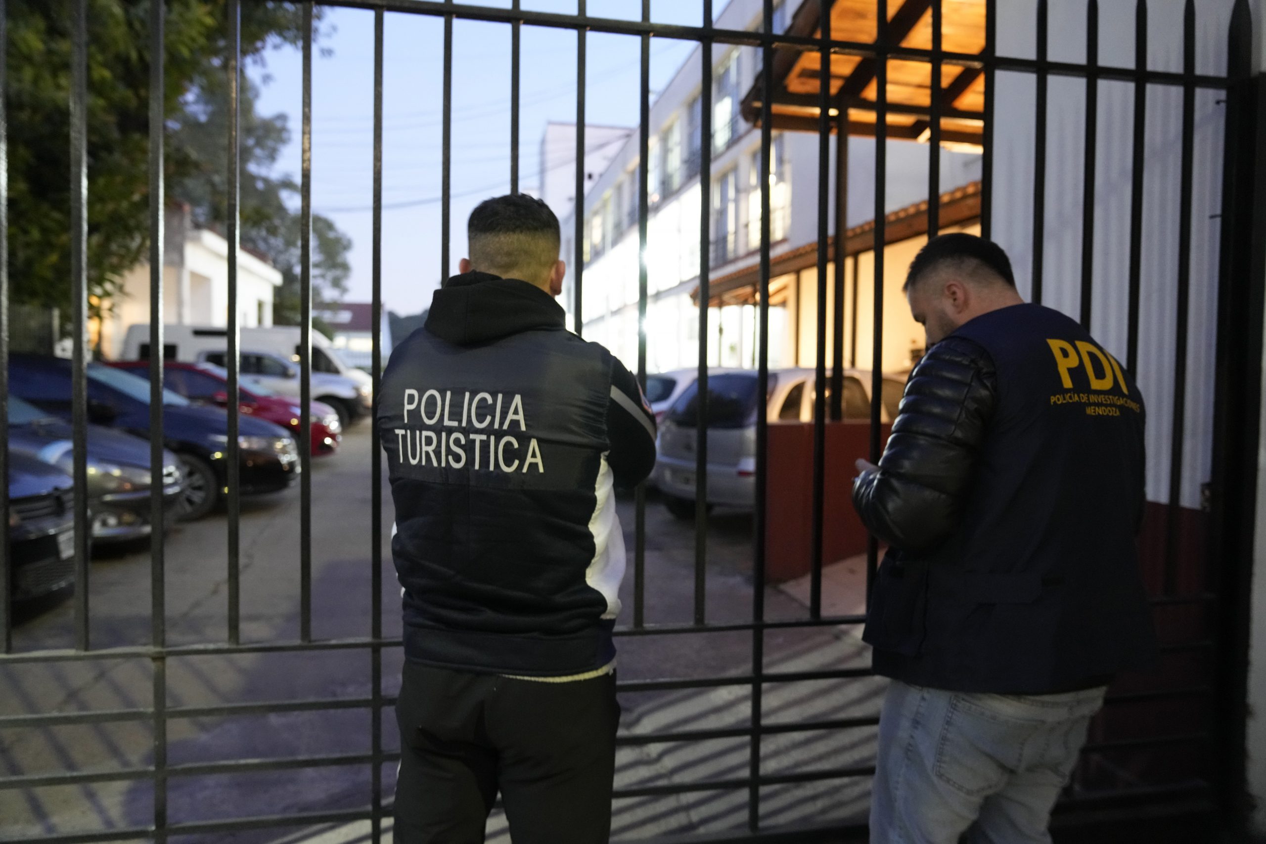 Police arrive at Interpol headquarters to get French rugby players Oscar Jegou and Hugo Auradou for their transfer.