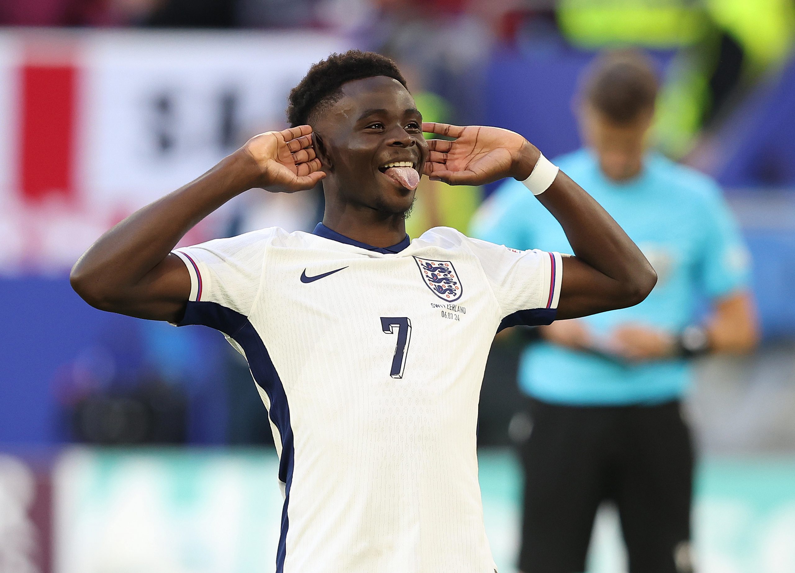 Bukayo Saka of England celebrates after scoring his penalty kick during the penalty shoot out during the UEFA EURO 2024 quarter-final match between England and Switzerland at Dusseldorf Arena on July 6, 2024 in Dusseldorf, Germany. (Photo by Crystal Pix/MB Media/Getty Images)