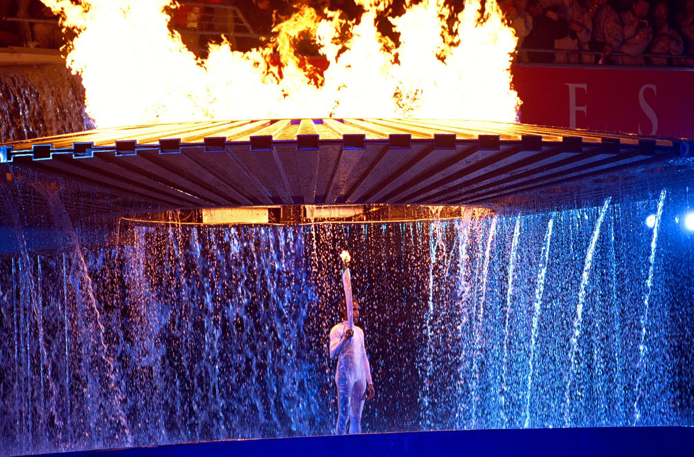 Cathy Freeman lighting the cauldron that would burn throughout the Sydney 2000 Olympics.