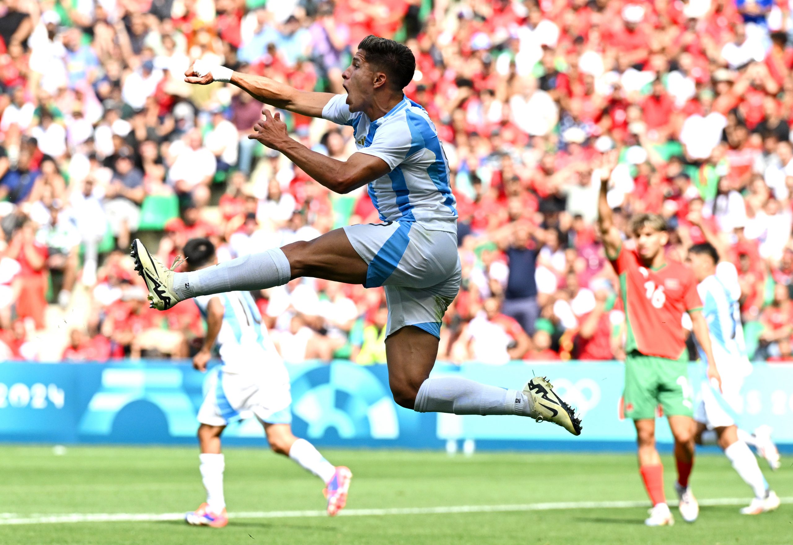 Giuliano Simeone of Argentina celebrates scoring.