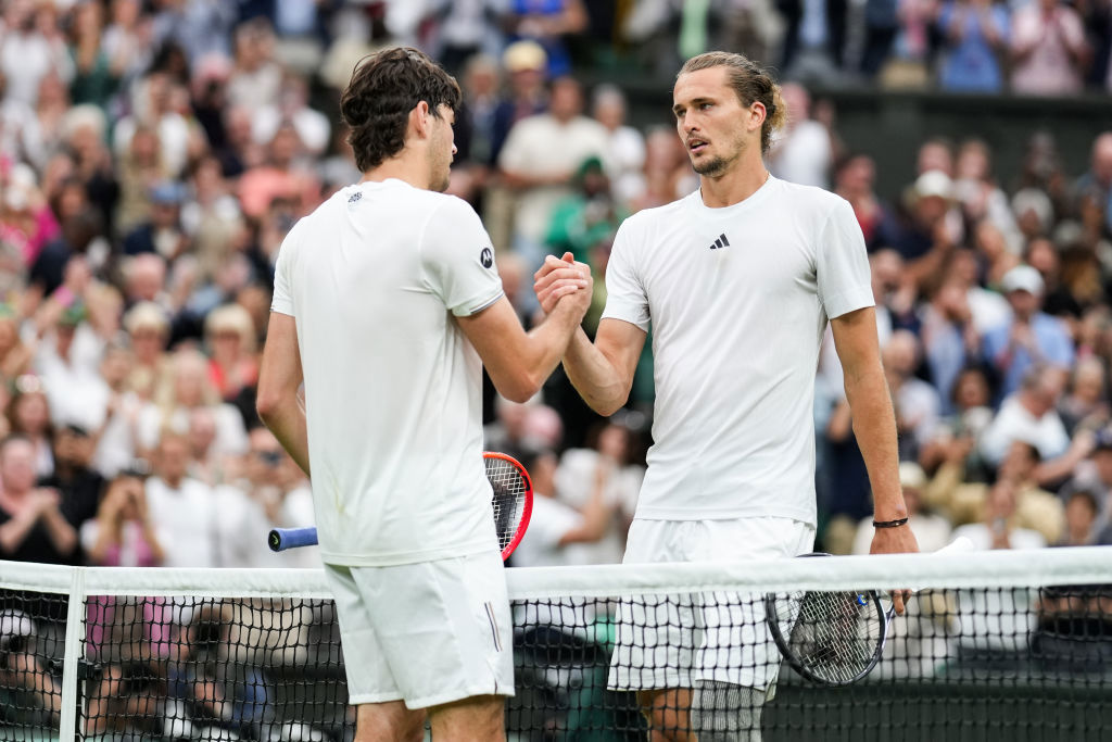 Taylor Fritz (L) with Alexander Zverev. Men's Singles fourth round match during day eight of The Championships Wimbledon 2024.