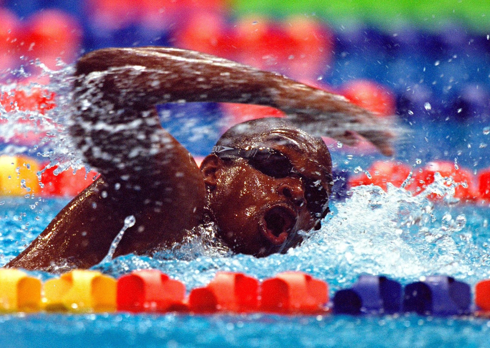 Eric Moussambani struggling down the pool.