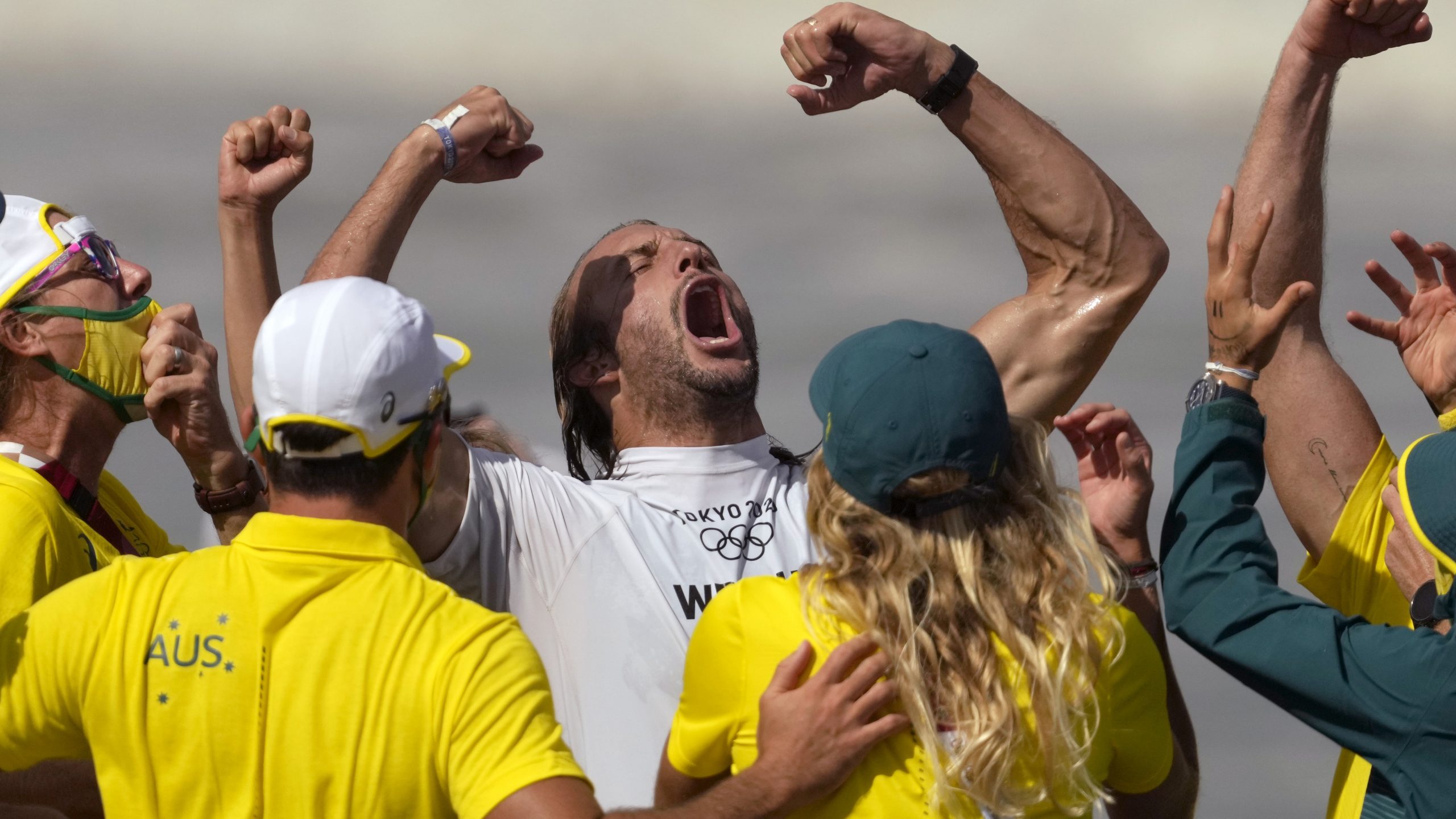 Owen Wright of Australia celebrates winning his men's Bronze Medal match against Gabriel Medina of Brazil.