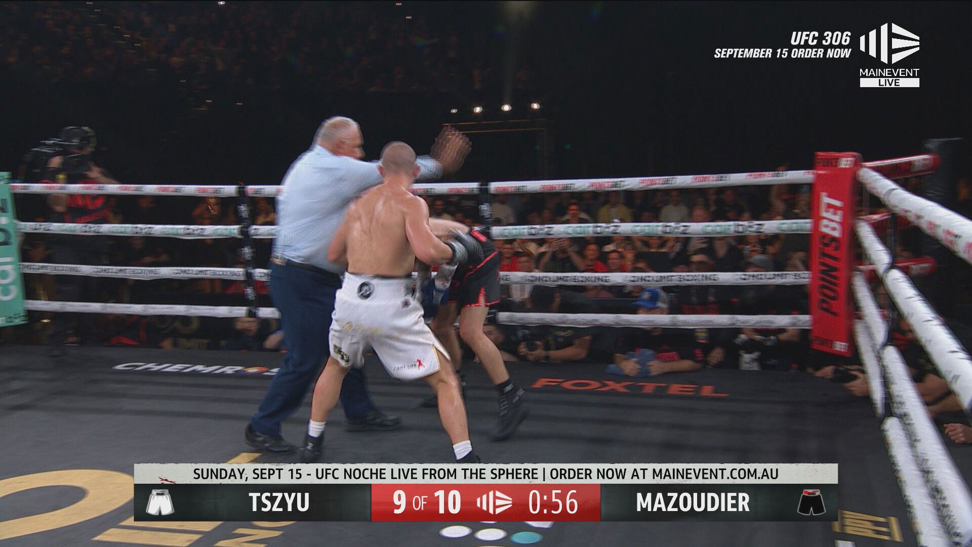 The referee intervenes in the ninth round to stop the fight between Nikita Tszyu and Koen Mazoudier. 