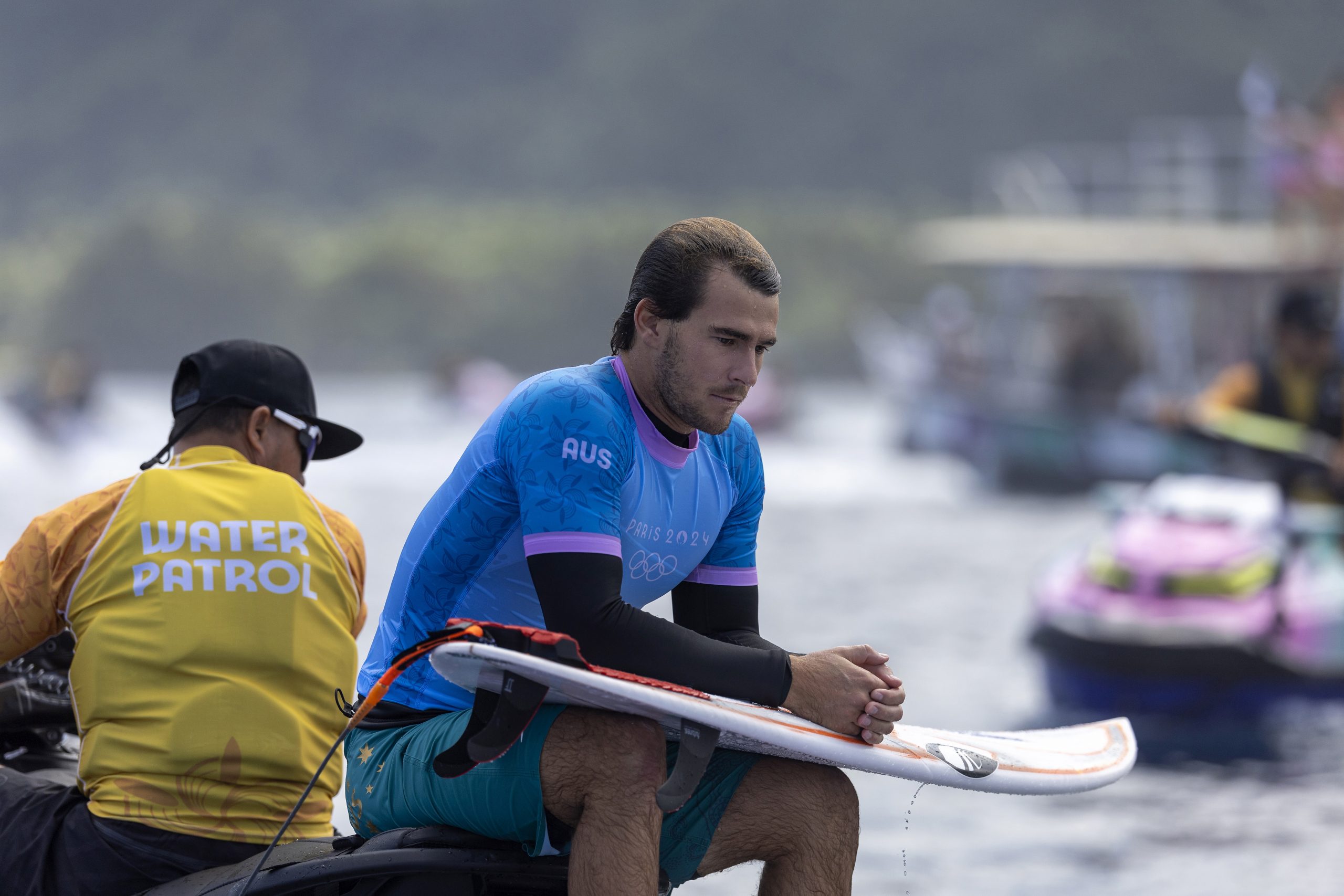 Jack Robinson of Team Australia looks on.