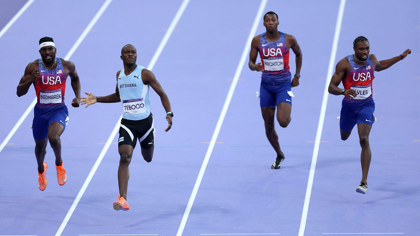 Letsile Tebogo streaking to victory in the men's 200m final in Paris, ahead of Kenneth Bednarek and Noah Lyles.