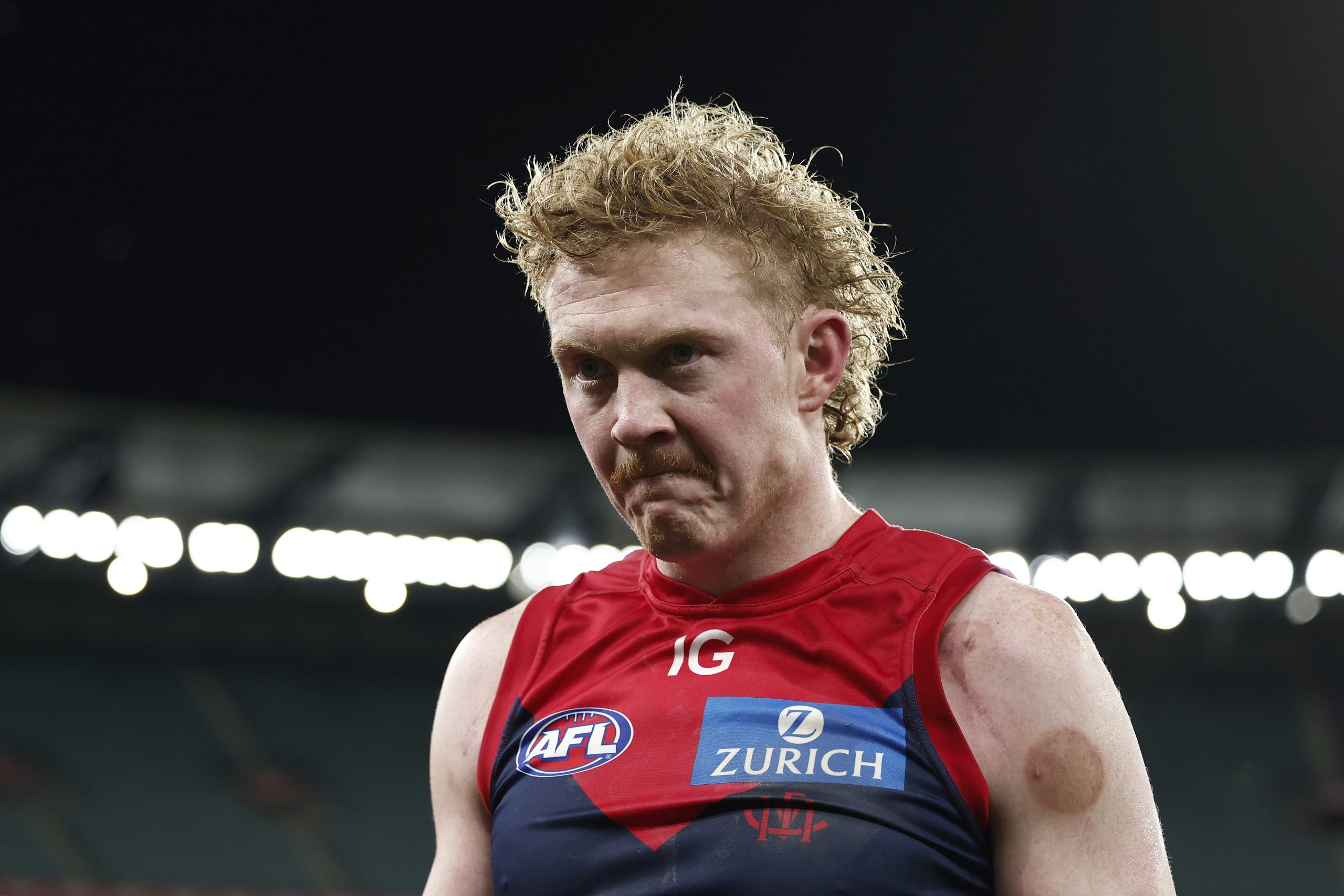 Clayton Oliver of the Demons looks dejected after their loss to GWS in round 20, 2024.