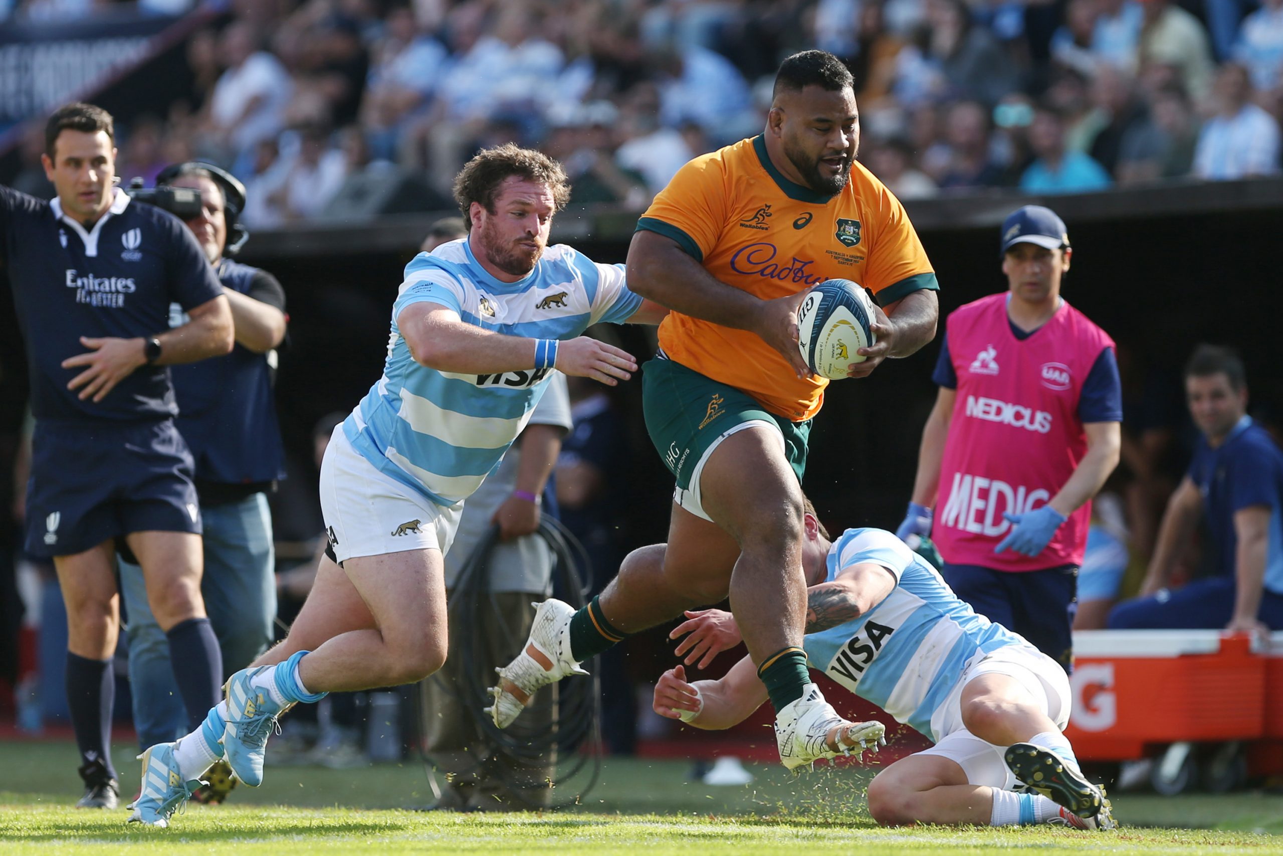 Taniela Tupou of Australia is tackled by Julian Montoya of Argentina.