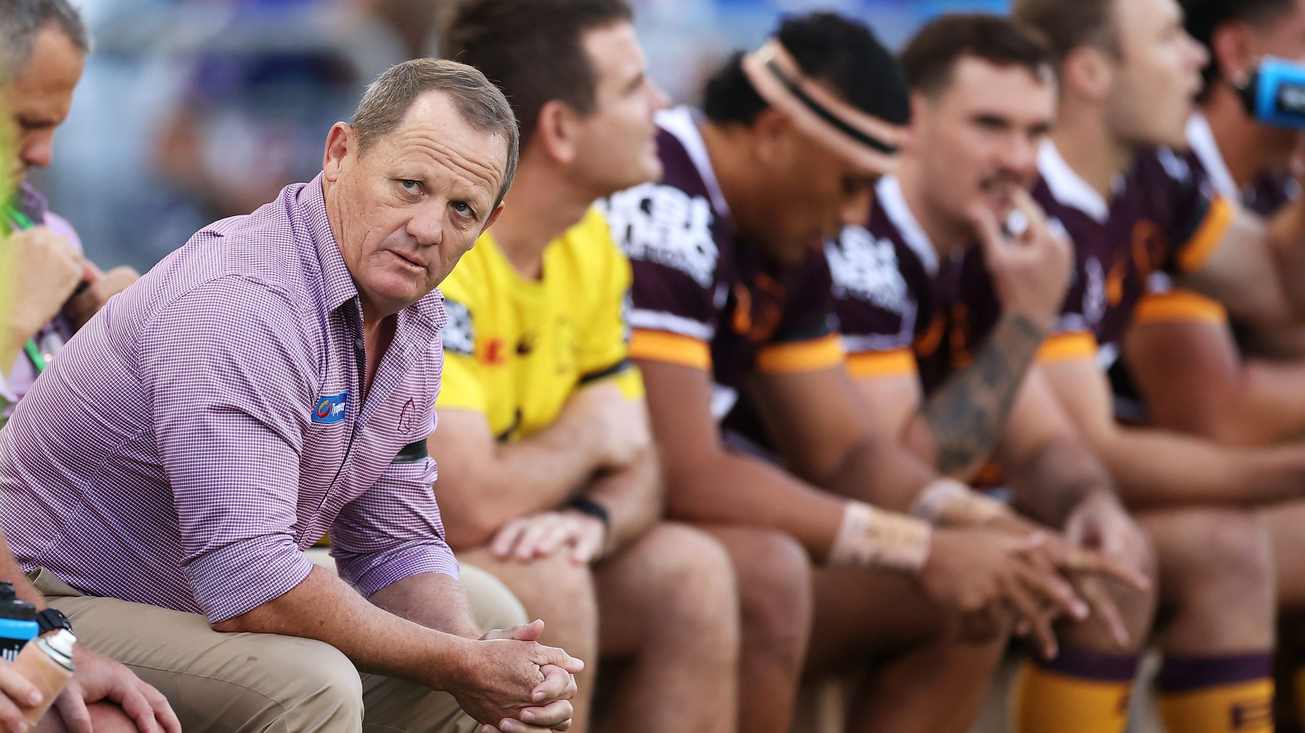 Broncos coach Kevin Walters watches on from the bench as his side plays the Bulldogs in round two.