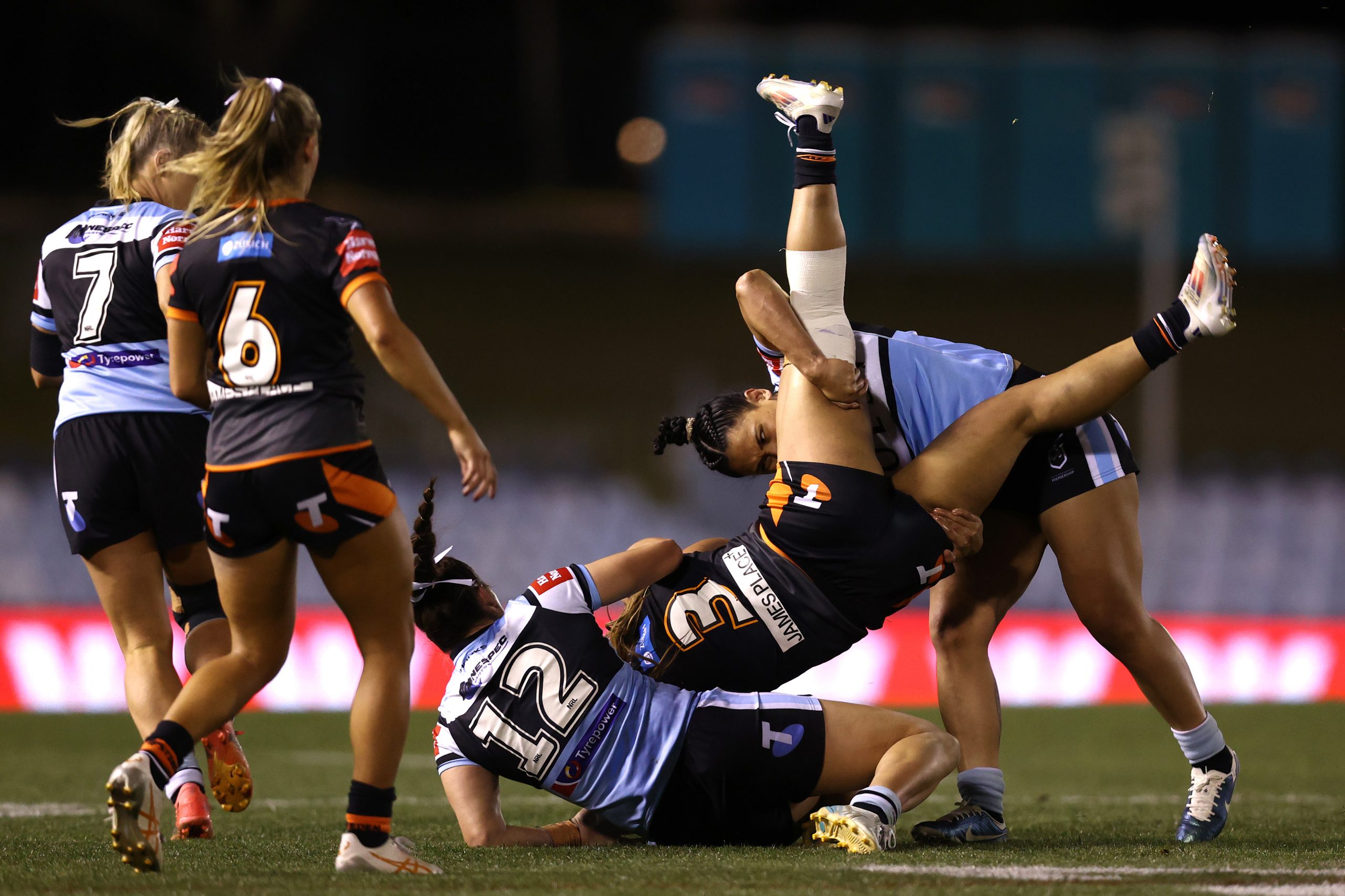 Leianne Tufuga of the Wests Tigers is tackled during the round nine NRLW match between Cronulla Sharks and Wests Tigers at PointsBet Stadium on September 19, 2024 in Sydney, Australia. (Photo by Jason McCawley/Getty Images)