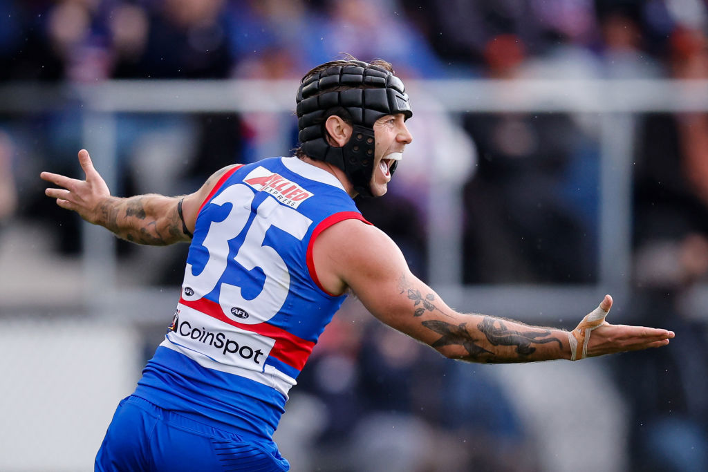 Caleb Daniel of the Bulldogs celebrates a goal.