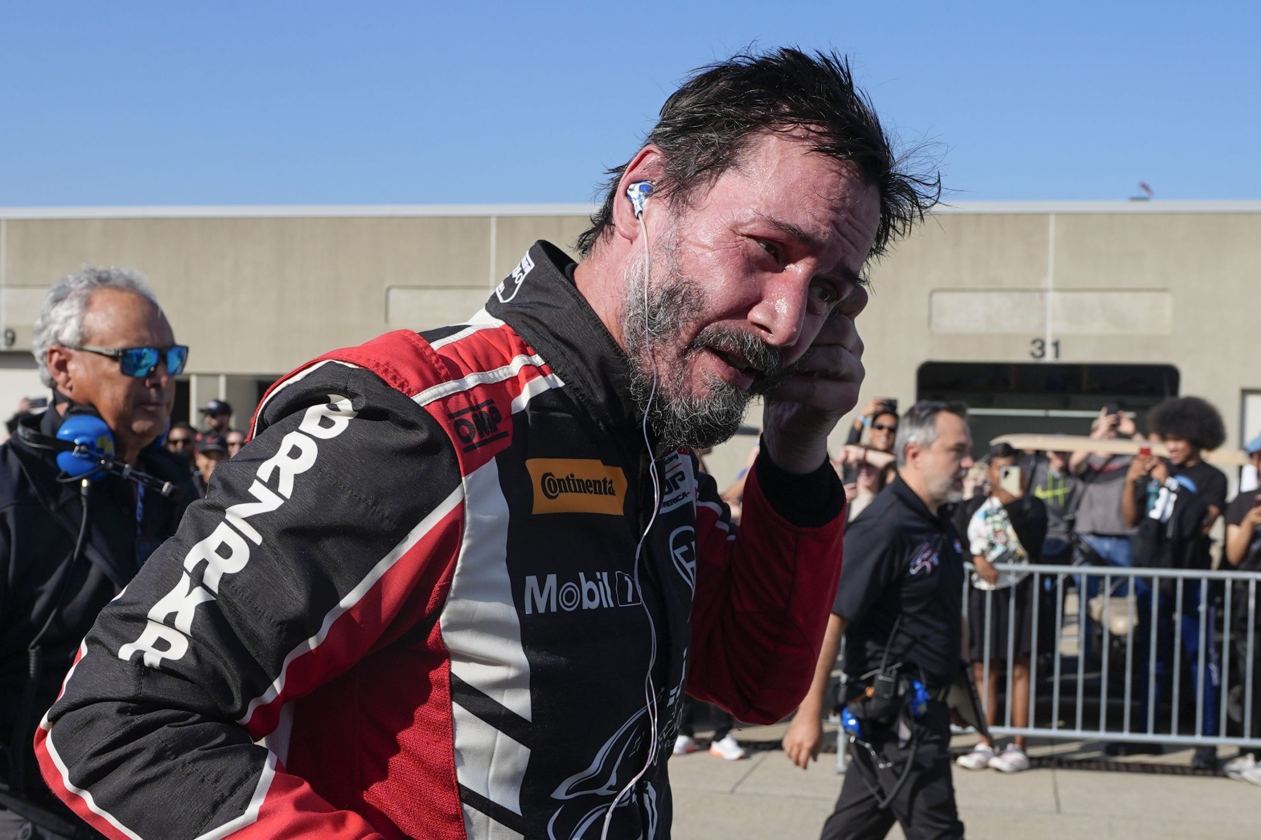 Keanu Reeves drives during the GR Cup Series auto race at Indianapolis Motor Speedway, Saturday, Oct. 5, 2024, in Indianapolis. (AP Photo/Darron Cummings)