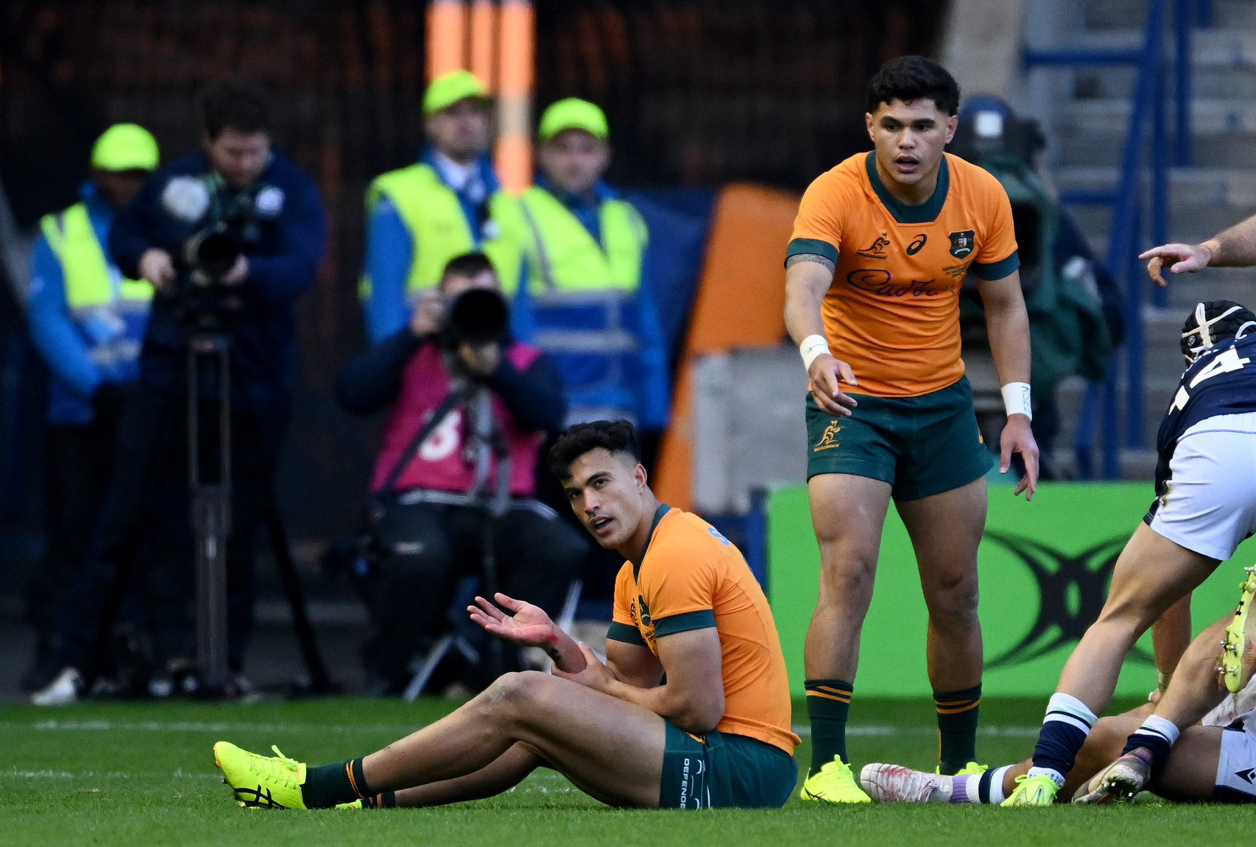 Joseph-Aukuso Suaalii of Australia reacts after suffering an injury.