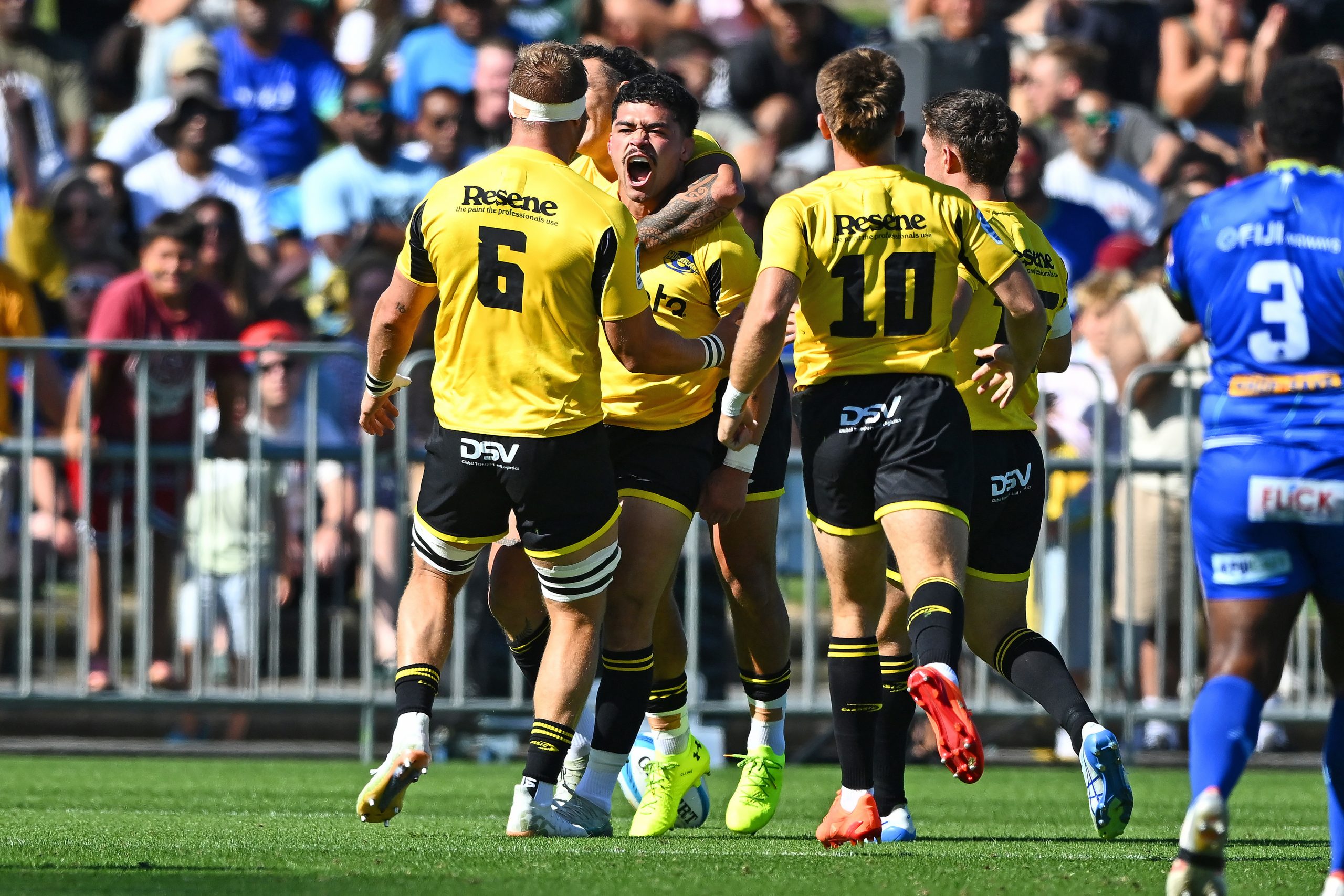 Du'Plessis Kirifi of the Hurricanes reacts after scoring a try.