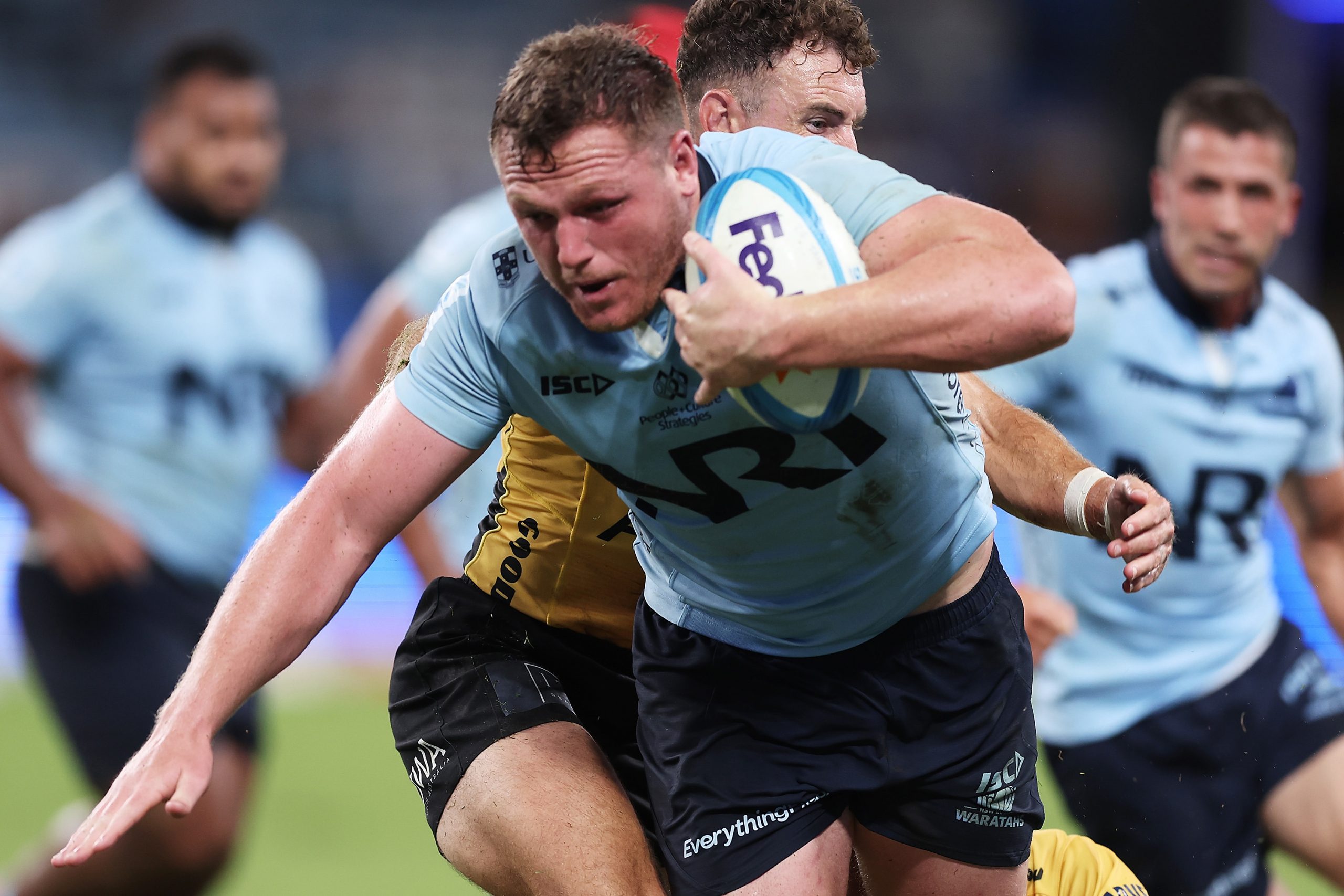Angus Bell of the Waratahs runs with the ball.