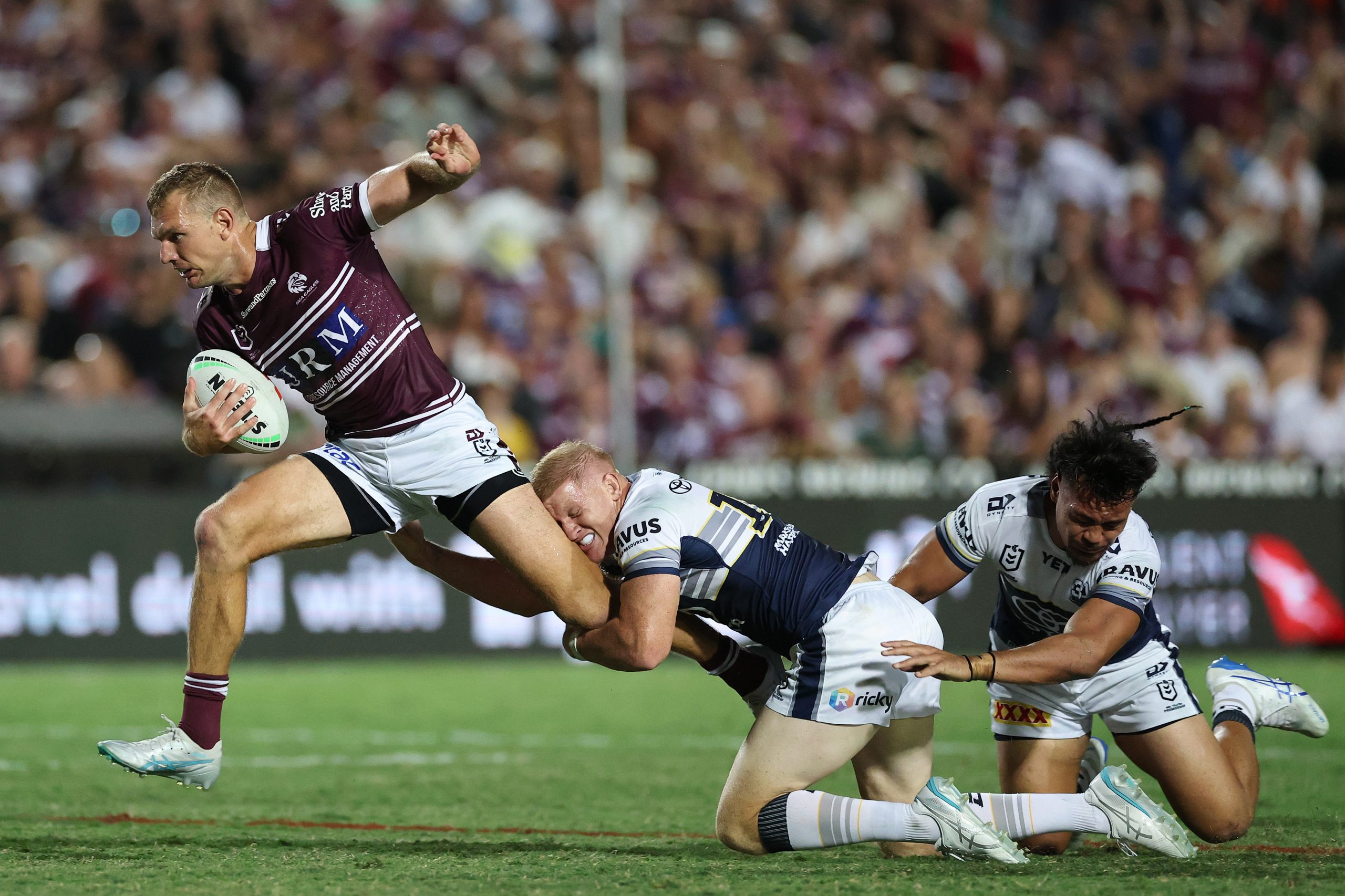 Tom Trbojevic of the Sea Eagles makes a break. 