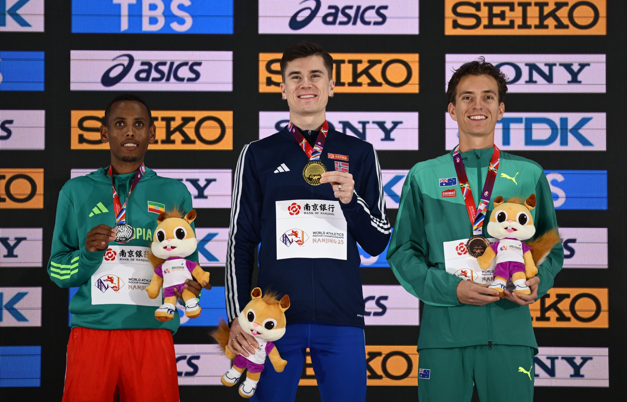 From left: Ethiopian silver medallist Berihu Aregawi, Norwegian gold medallist Jakob Ingebrigtsen, and Australian bronze medallist Ky Robinson.