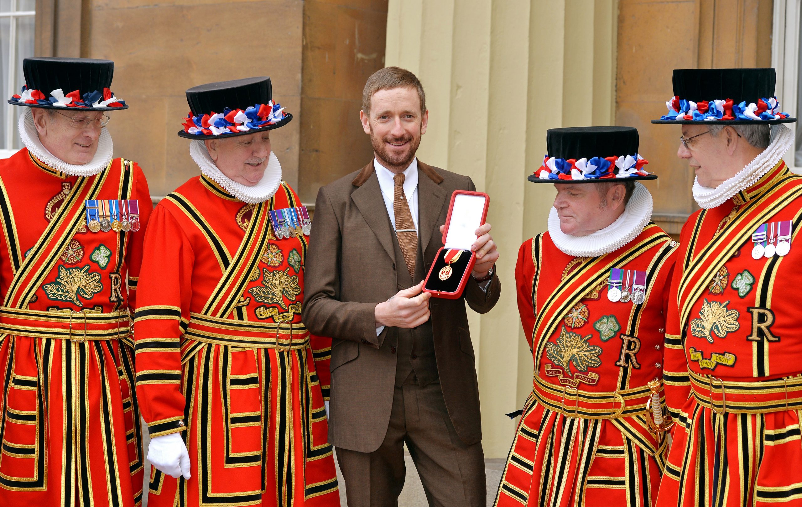 Bradley Wiggins receives his knighthood in 2013.