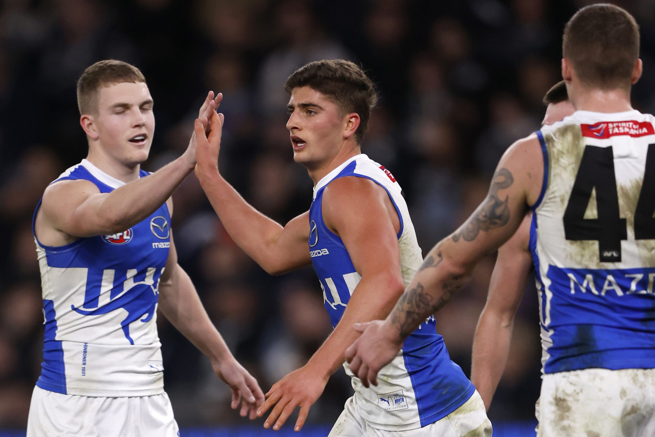 Harry Sheezel of the Kangaroos celebrates a goal.